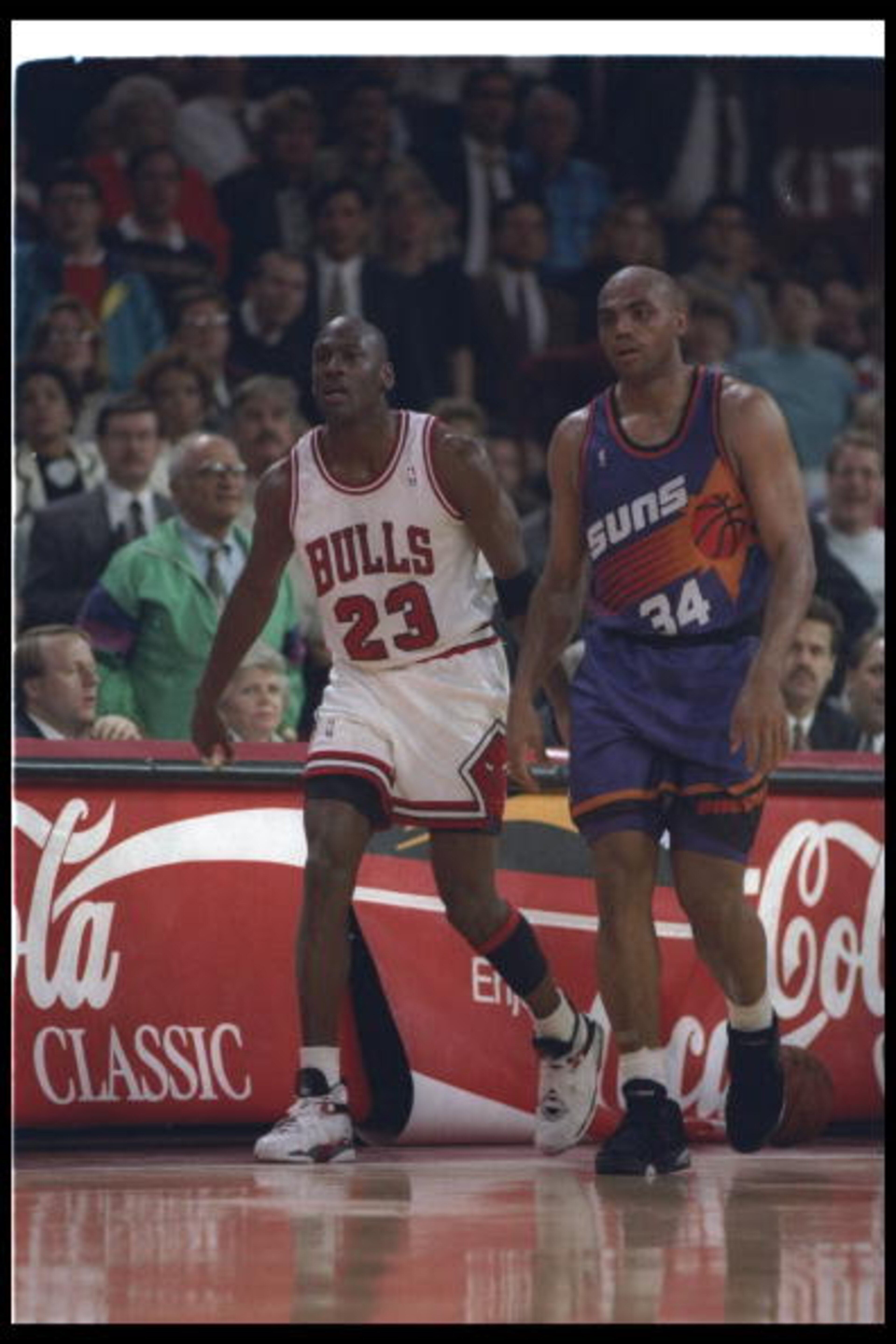 1992-1993: Guard Michael Jordan of the Chicago Bulls (left) and forward Charles Barkley of the Phoenix Suns walk down the court during a game at the United Center in Chicago, Illinois. Mandatory Credit: Jonathan Daniel /Allsport 1992-1993: Guard Michael Jordan of the Chicago Bulls (left) and forward Charles Barkley of the Phoenix Suns walk down the court during a game at the United Center in Chicago, Illinois. Mandatory Credit: Jonathan Daniel /Allsport