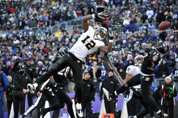 BALTIMORE, MD - DECEMBER 19:  Marques Colston #12 of the New Orleans Saints goes up for a ball that was caught by Lance Moore #16 during the game against the Baltimore Ravens  at M&T Bank Stadium on December 19, 2010 in Baltimore, Maryland. The Ravens def