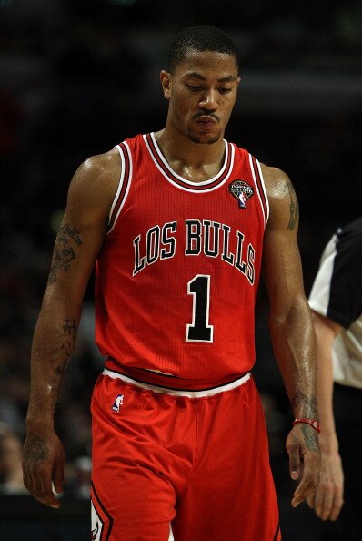 CHICAGO, IL - MARCH 28: Derrick Rose #1 of the Chicago Bulls reacts to a loss against the Philadelphia 76ers at the United Center on March 28, 2011 in Chicago, Illinois. The 76ers defeated the Bulls 97-85. NOTE TO USER: User expressly acknowledges and agr