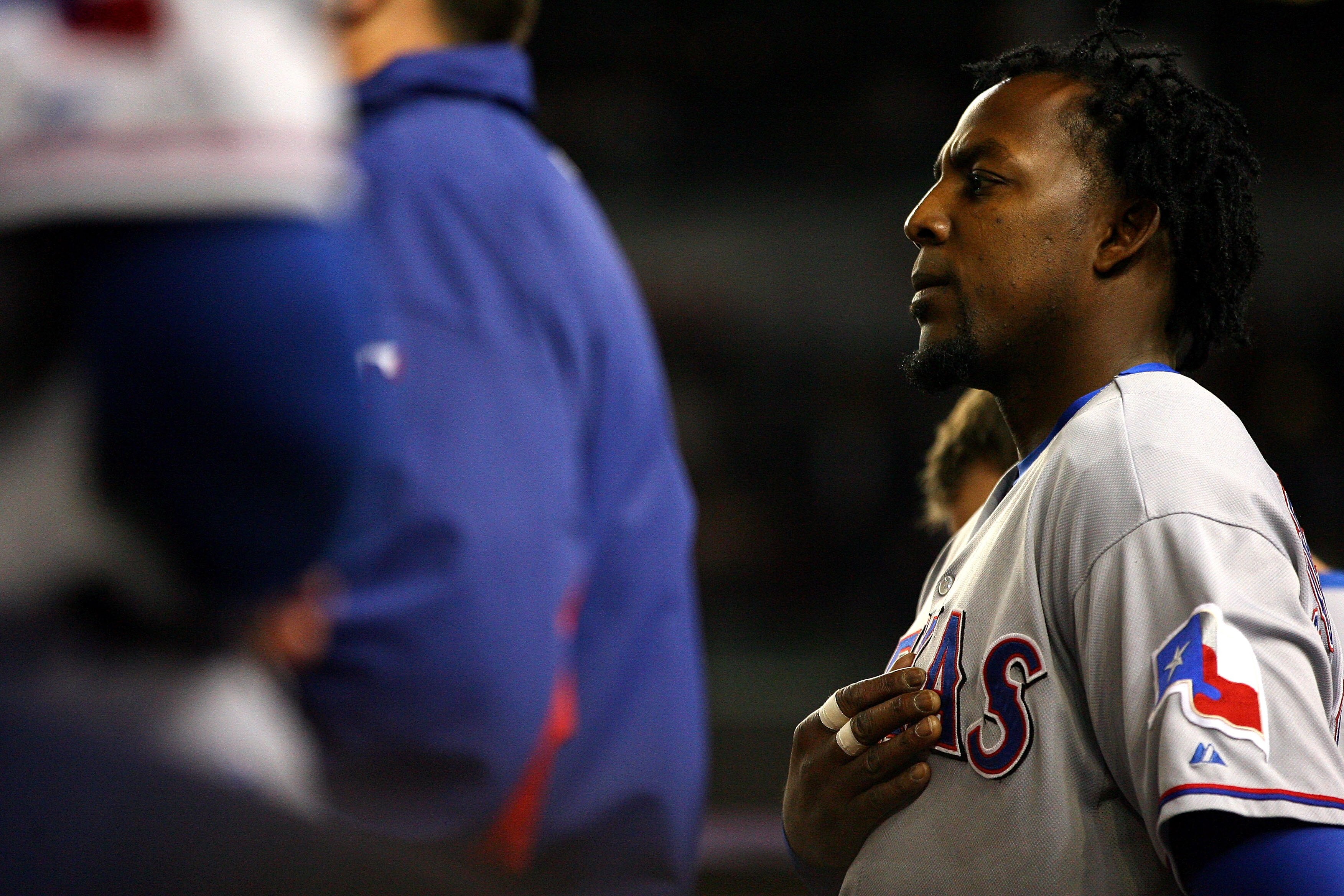 NEW YORK - OCTOBER 19:  Vladimir Guerrero #27 of the Texas Rangers stands for the performance of the National Anthem against the New York Yankees  in Game Four of the ALCS during the 2010 MLB Playoffs at Yankee Stadium on October 19, 2010 in the Bronx bor
