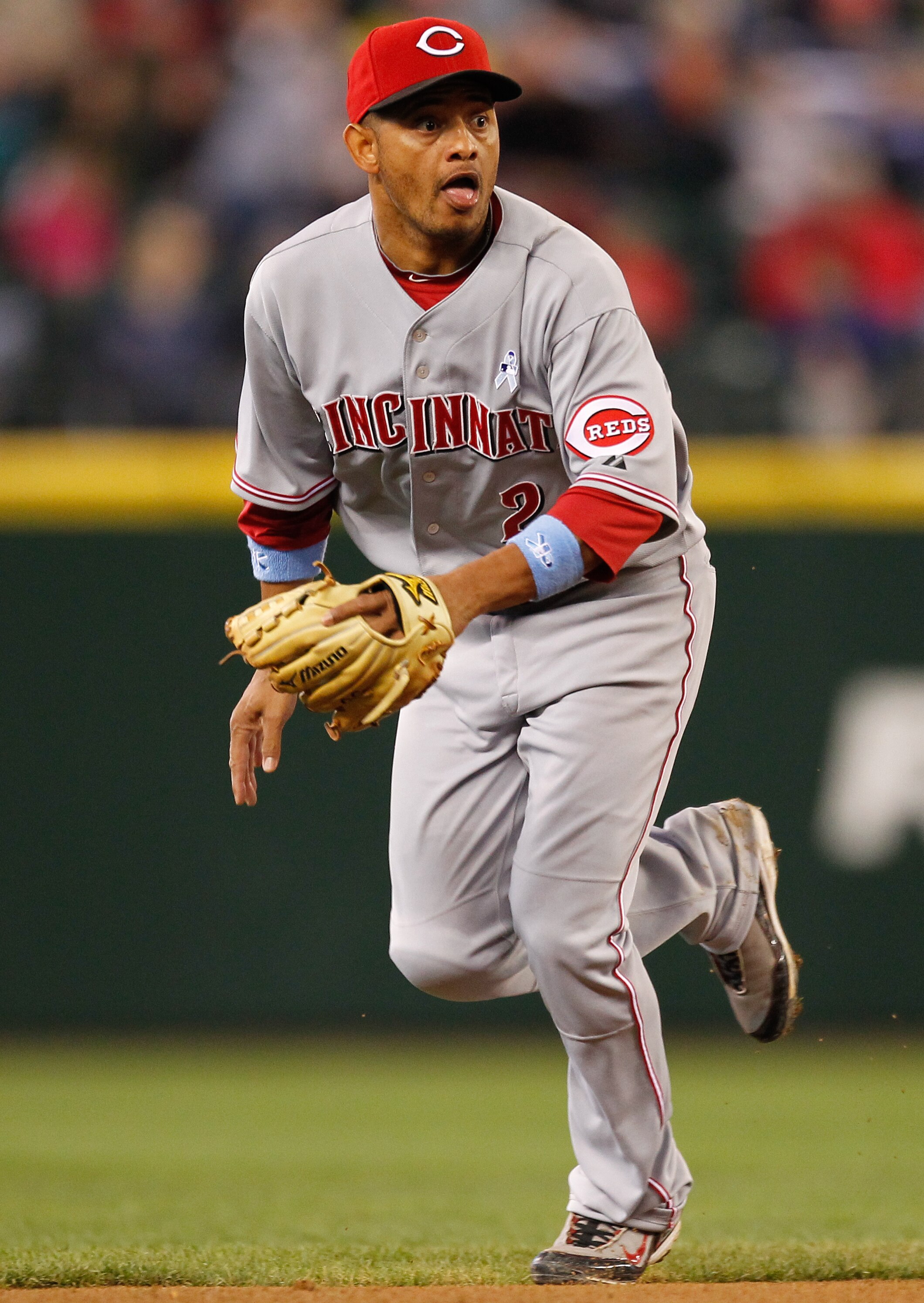 SEATTLE - JUNE 20:  Shortstop Orlando Cabrera #2 of the Cincinnati Reds fields a grounder during the game against the Seattle Mariners on June 20, 2010 at Safeco Field in Seattle, Washington. (Photo by Otto Greule Jr/Getty Images)