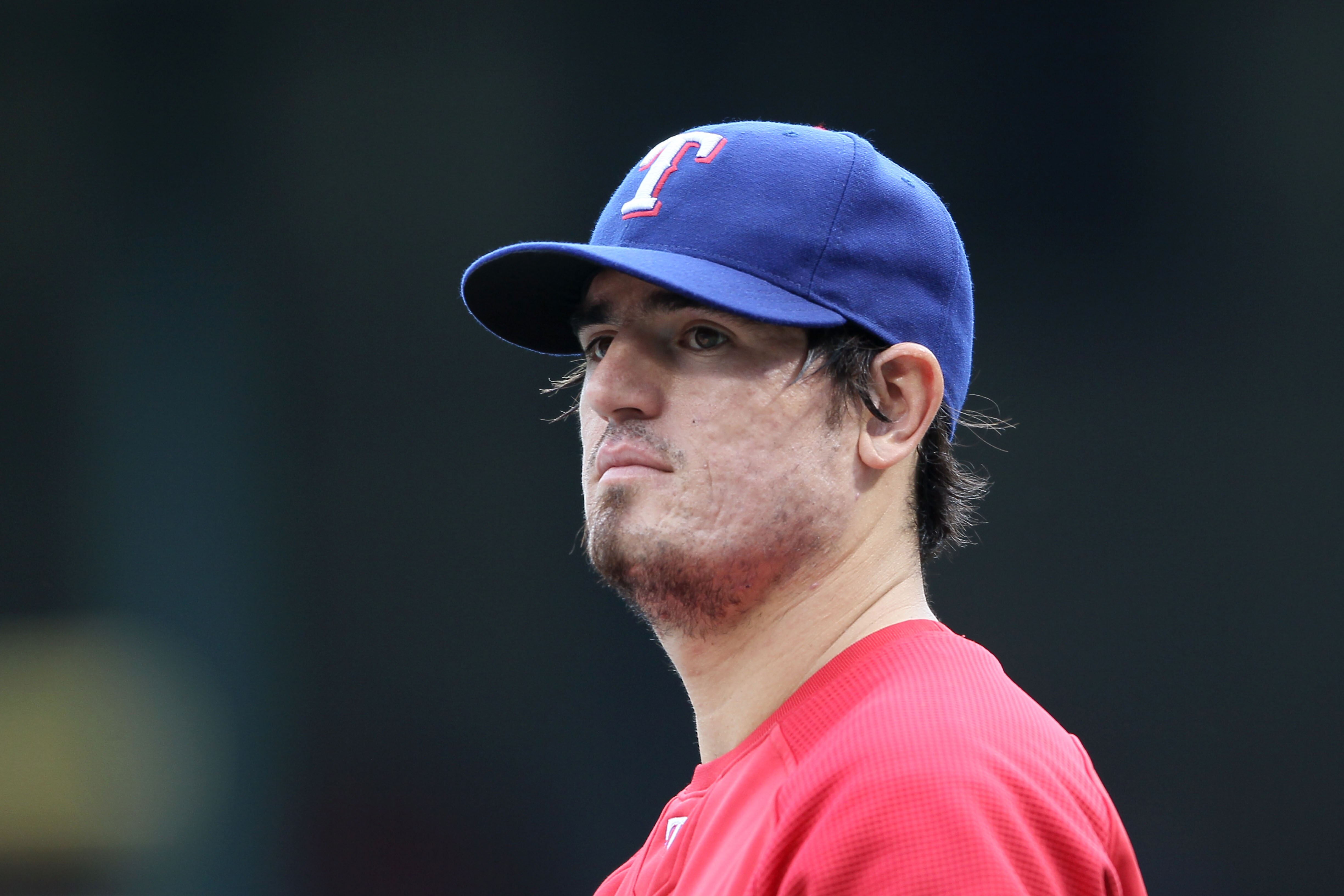 ARLINGTON, TX - OCTOBER 22:  Jorge Cantu #8 of the Texas Rangers looks on during batting practice against the New York Yankees in Game Six of the ALCS during the 2010 MLB Playoffs at Rangers Ballpark in Arlington on October 22, 2010 in Arlington, Texas.