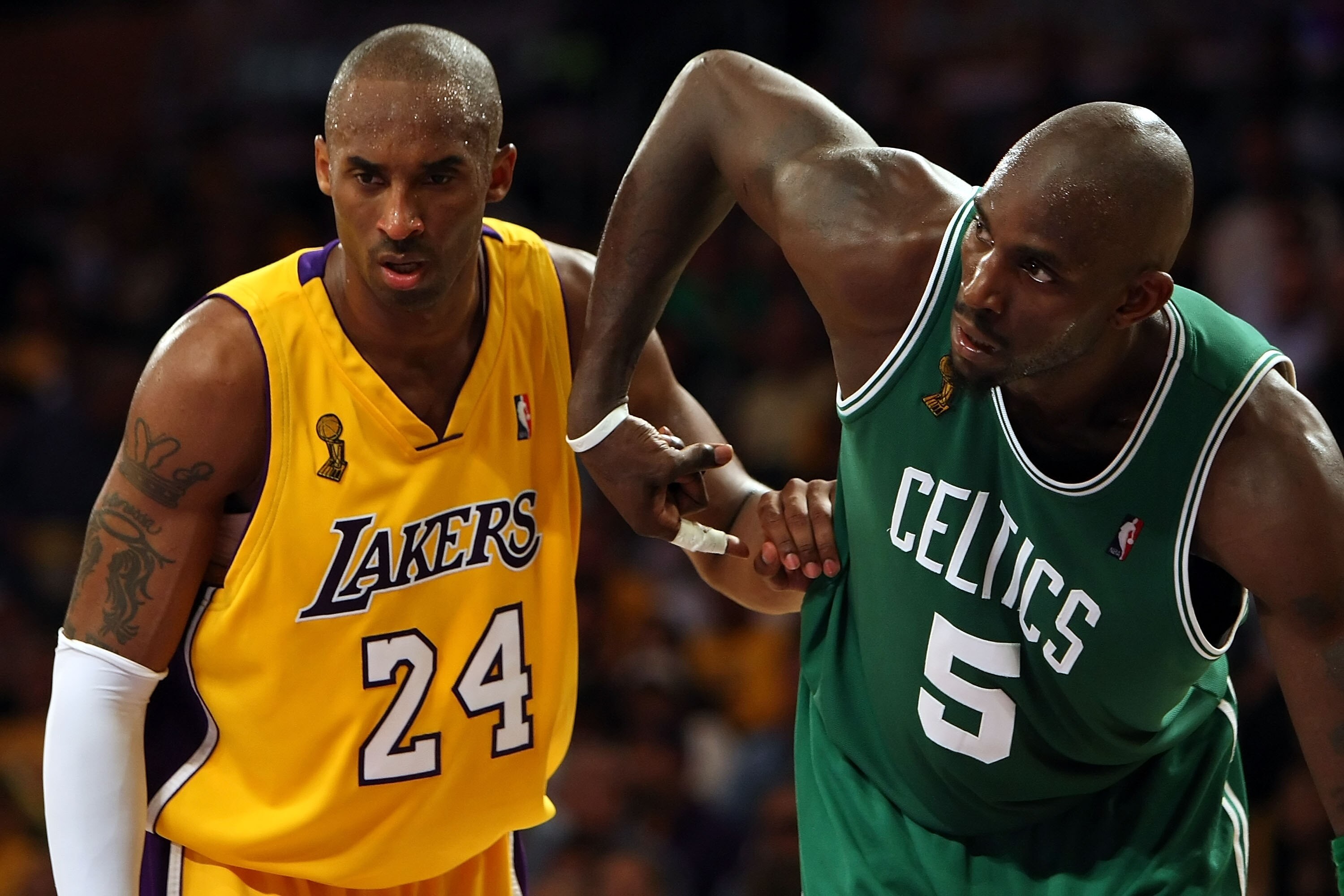 LOS ANGELES, CA - JUNE 10:  Kobe Bryant #24 of the Los Angeles Lakers puts his arm on Kevin Garnett #5 of the Boston Celtics in Game Three of the 2008 NBA Finals on June 10, 2008 at Staples Center in Los Angeles, California. NOTE TO USER: User expressly a