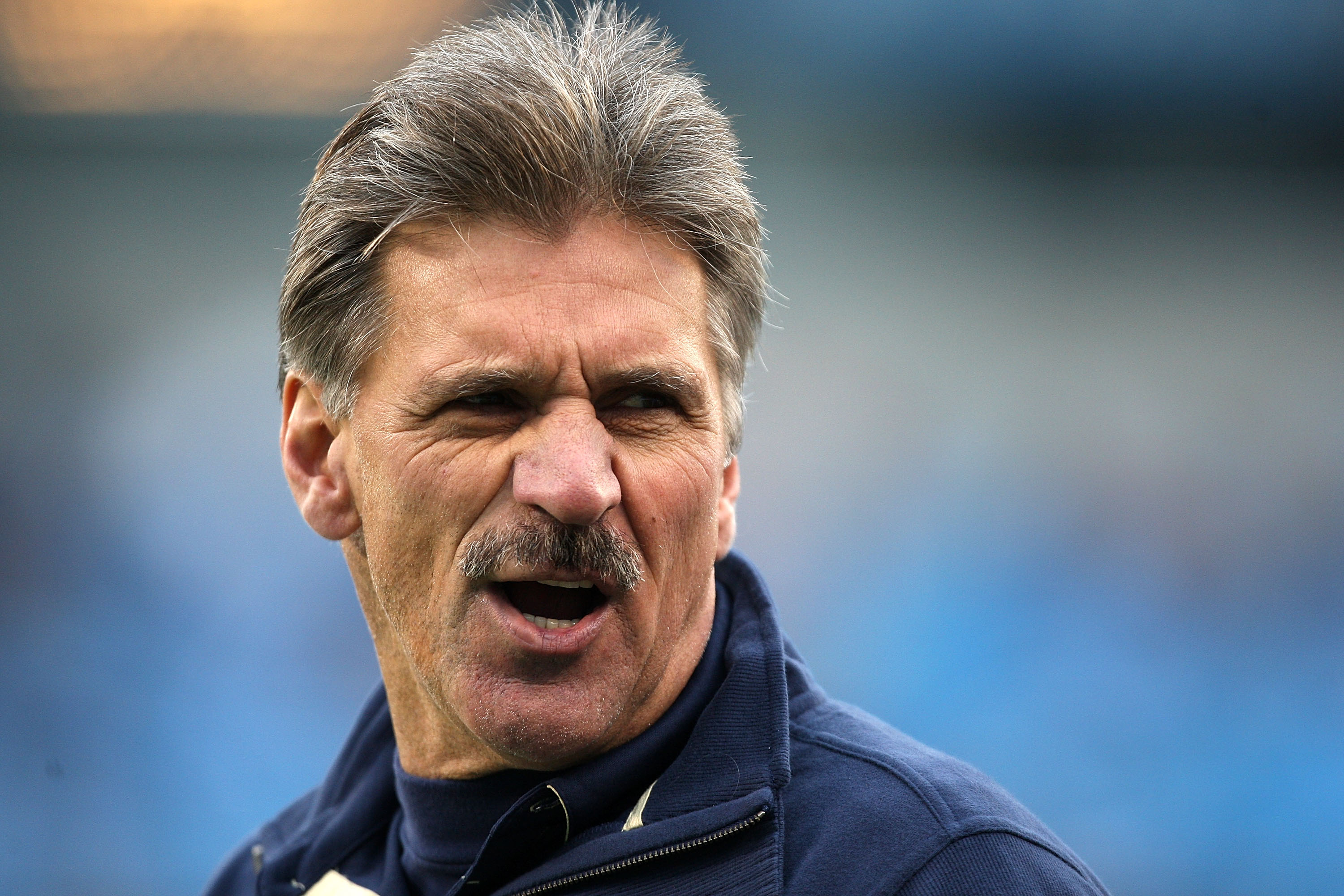 CHARLOTTE, NC - DECEMBER 26:  Head coach Dave Wannstedt of the Pittsburgh Panthers smiles before the start of their game against the North Carolina Tar Heels on December 26, 2009 in Charlotte, North Carolina.  (Photo by Streeter Lecka/Getty Images)