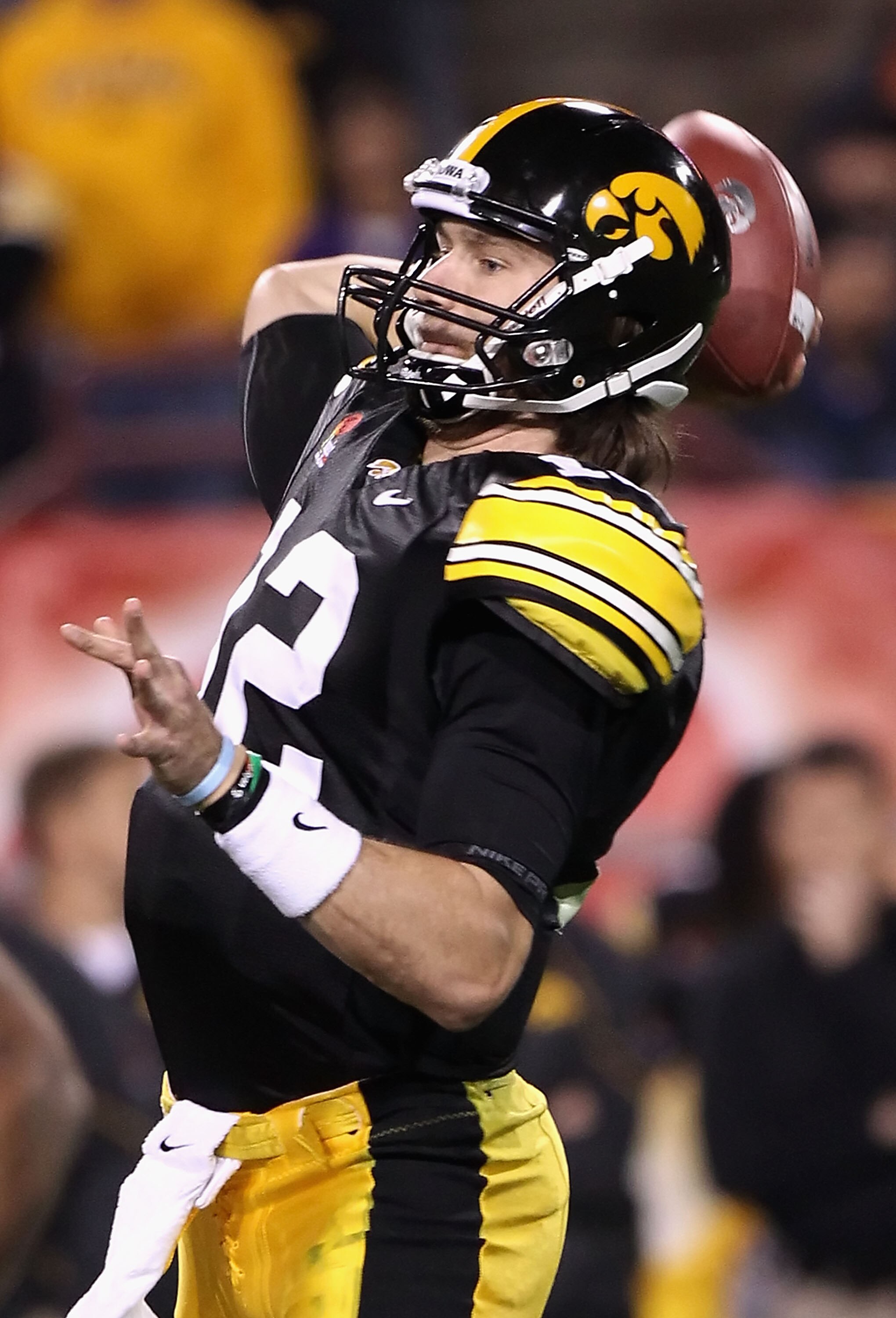 TEMPE, AZ - DECEMBER 28:  Quarterback Ricky Stanzi #12 of the Iowa Hawkeyes throws a pass during the Insight Bowl against the Missouri Tigers at Sun Devil Stadium on December 28, 2010 in Tempe, Arizona.  (Photo by Christian Petersen/Getty Images)