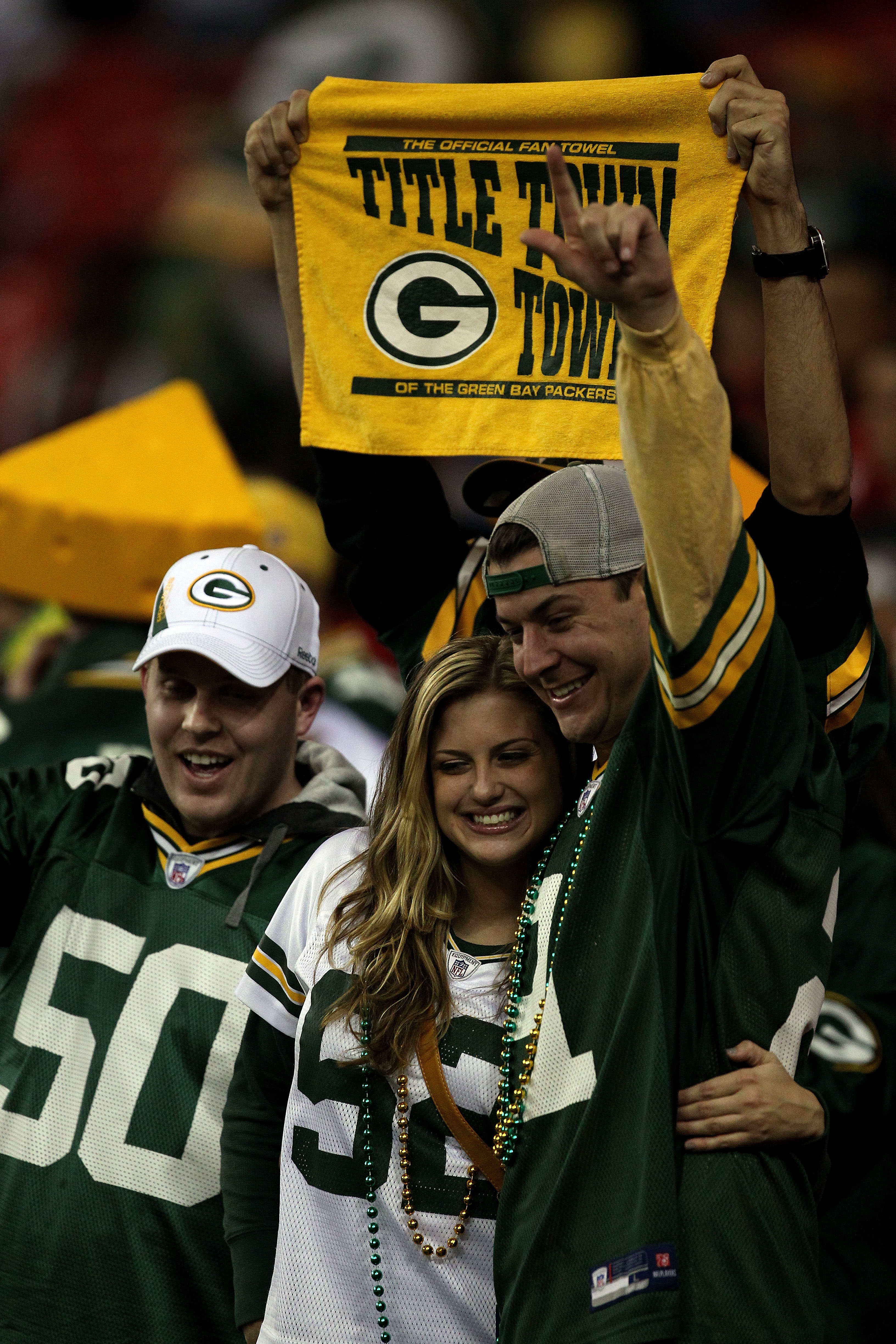 ATLANTA, GA - JANUARY 15:  Fans of the Green Bay Packers support their against  the Atlanta Falcons during their 2011 NFC divisional playoff game at Georgia Dome on January 15, 2011 in Atlanta, Georgia. The Packers won 48-21. (Photo by Streeter Lecka/Gett