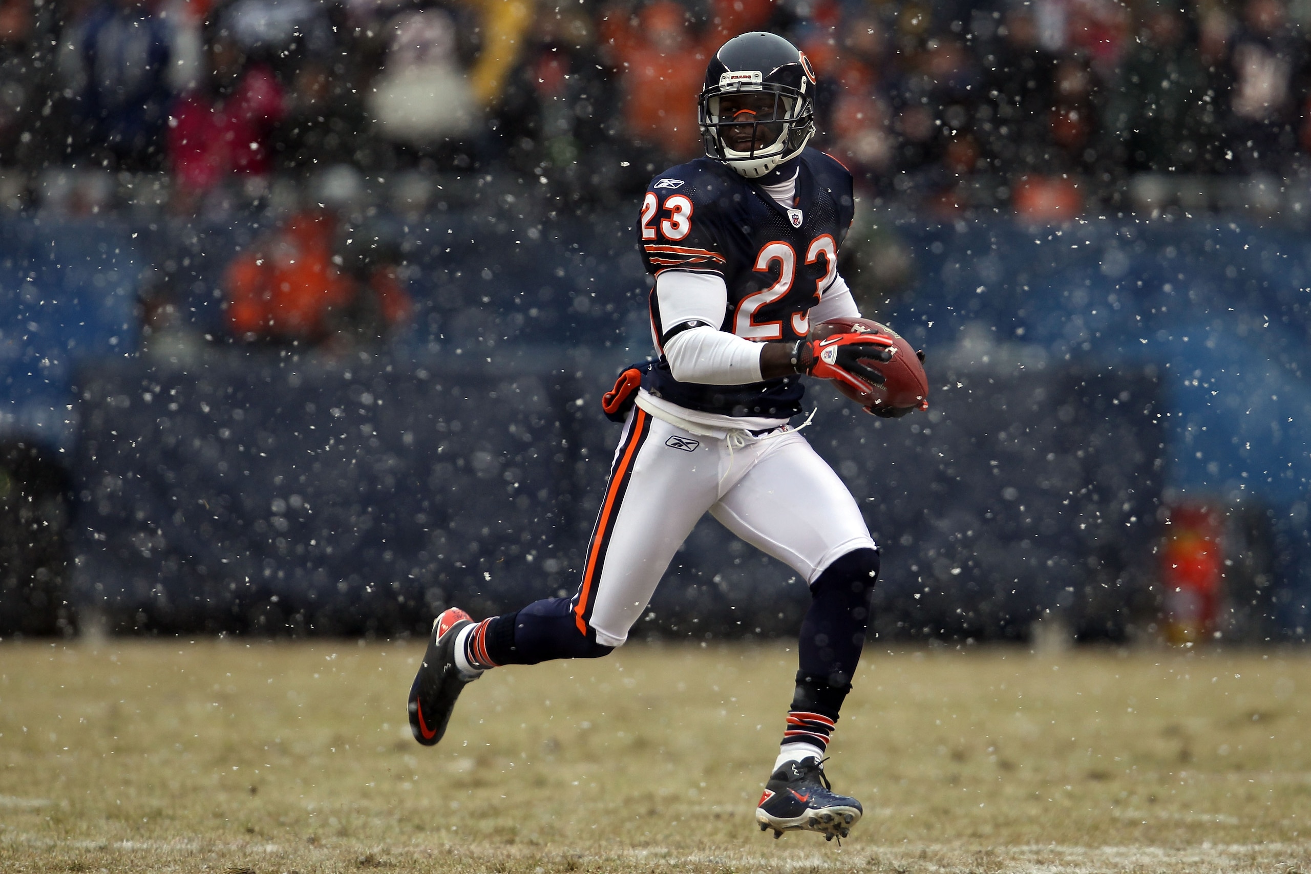 CHICAGO, IL - JANUARY 16: Kick returner Devin Hester #23 of the Chicago Bears returns a punt in the first half against the Seattle Seahawks in the 2011 NFC divisional playoff game at Soldier Field on January 16, 2011 in Chicago, Illinois. (Photo by Jona CHICAGO, IL - JANUARY 16: Kick returner Devin Hester #23 of the Chicago Bears returns a punt in the first half against the Seattle Seahawks in the 2011 NFC divisional playoff game at Soldier Field on January 16, 2011 in Chicago, Illinois. (Photo by Jona