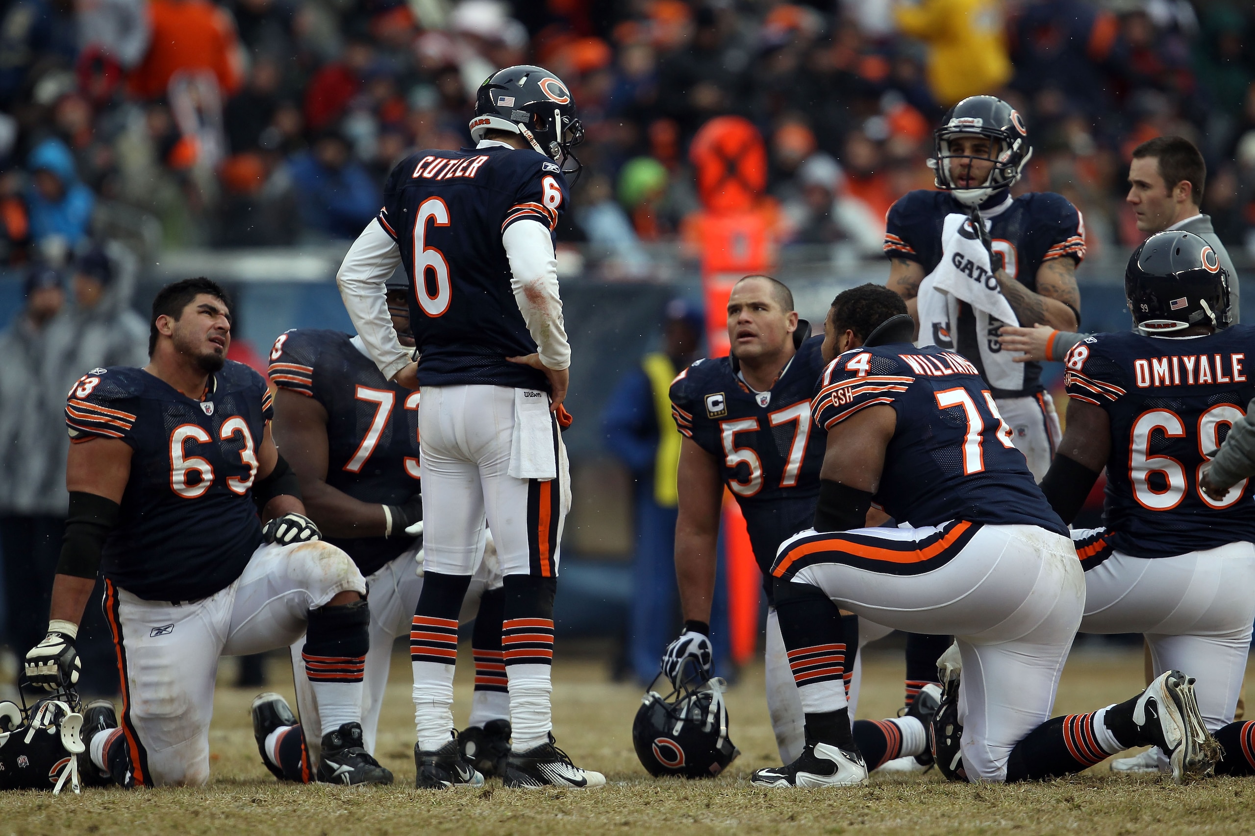 CHICAGO, IL - JANUARY 16: Quarterback Jay Cutler #6 of the Chicago Bears talks with his offense as Marcus Trufant #23 of the Seattle Seahawks is injured on the field in the second half against the Seattle Seahawks in the 2011 NFC divisional playoff game CHICAGO, IL - JANUARY 16: Quarterback Jay Cutler #6 of the Chicago Bears talks with his offense as Marcus Trufant #23 of the Seattle Seahawks is injured on the field in the second half against the Seattle Seahawks in the 2011 NFC divisional playoff game