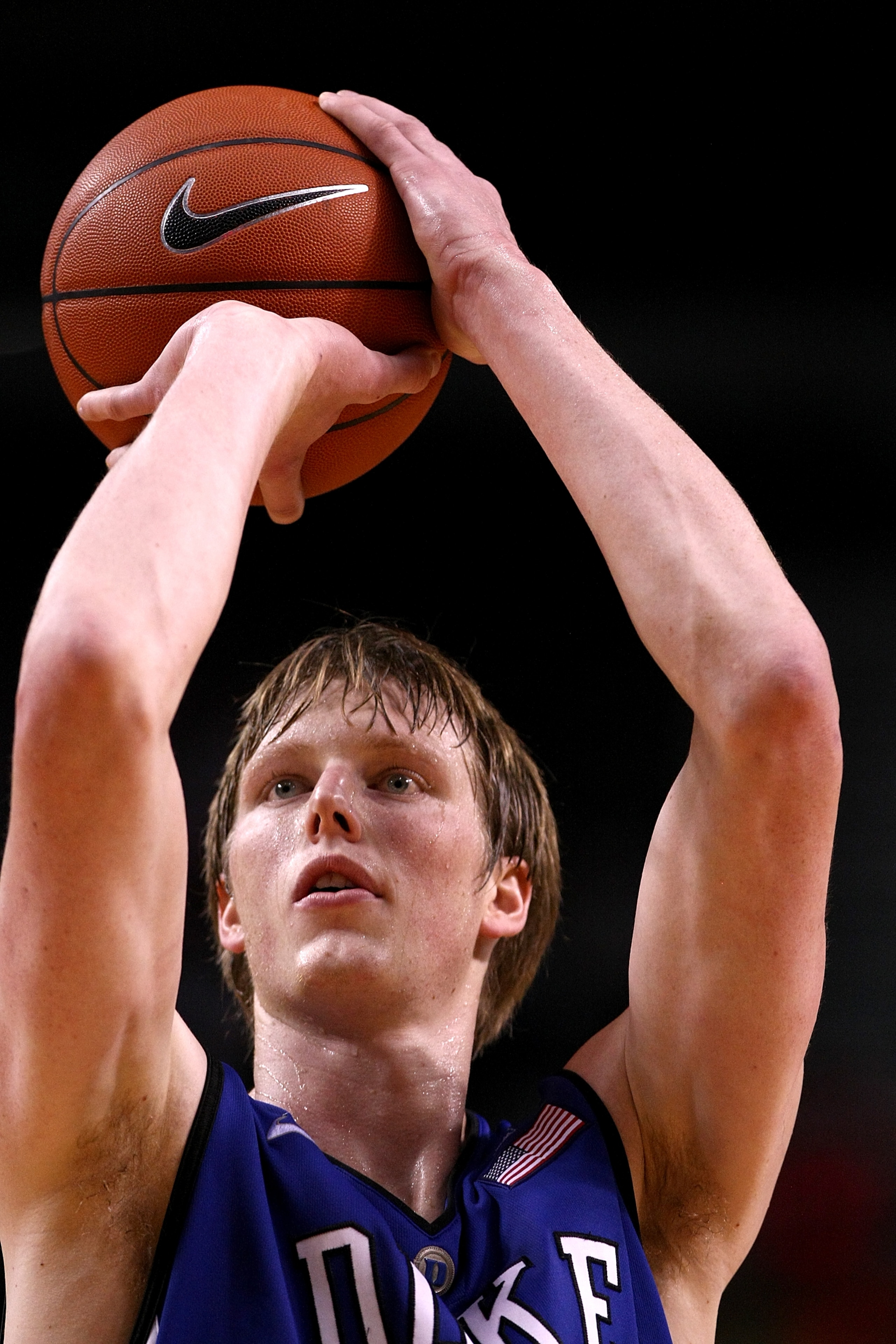 PORTLAND, OR - NOVEMBER 27:  Kyle Singler #12 of the Duke Blue Devils shoots a free throw against the Oregon Ducks on November 27, 2010 at the Rose Garden in Portland, Oregon.  (Photo by Jonathan Ferrey/Getty Images)