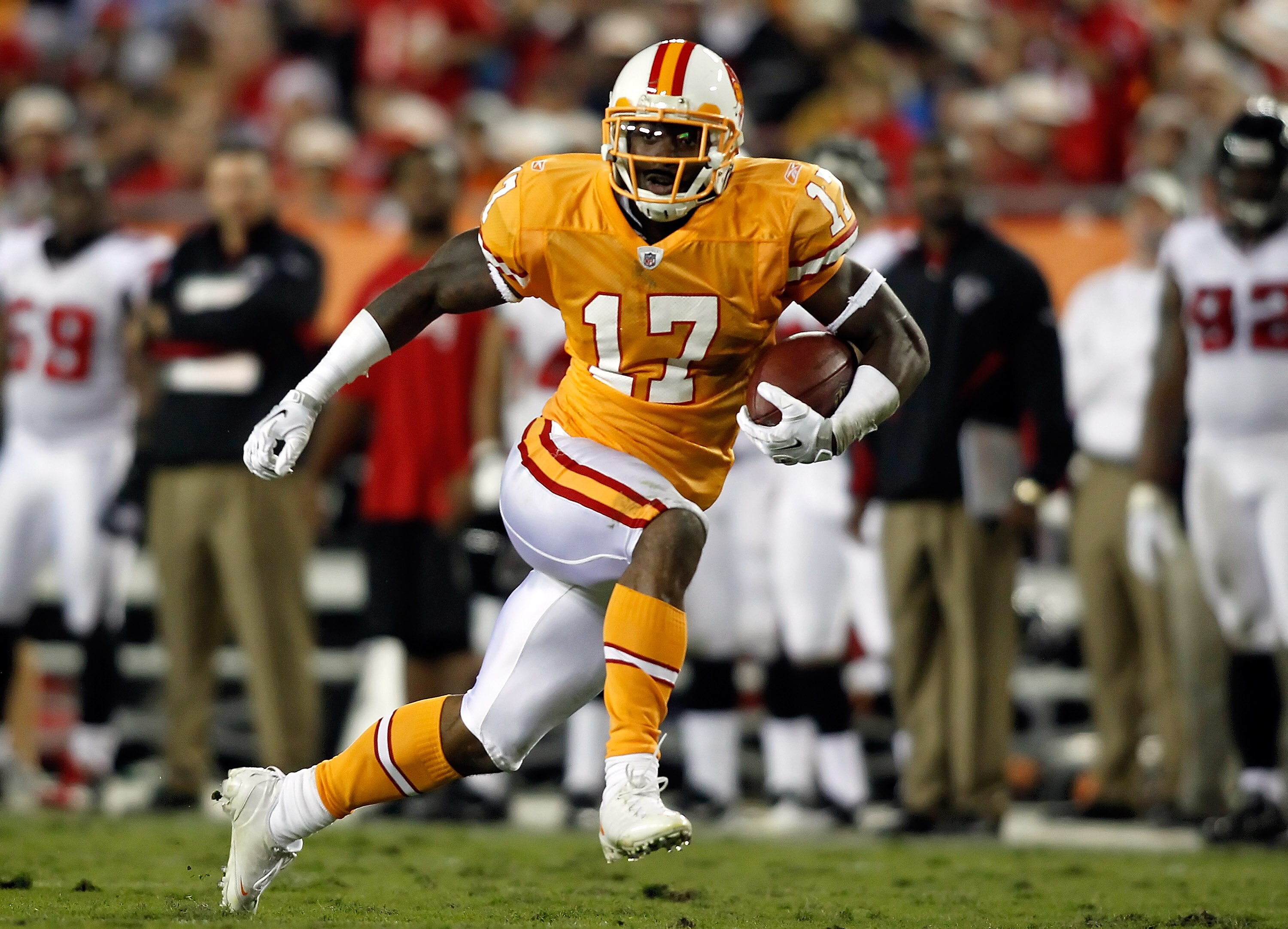 TAMPA, FL - DECEMBER 05:  Receiver Arrelious Benn #17 of the Tampa Bay Buccaneers runs after a catch against the Atlanta Falcons during the game at Raymond James Stadium on December 5, 2010 in Tampa, Florida.  (Photo by J. Meric/Getty Images)