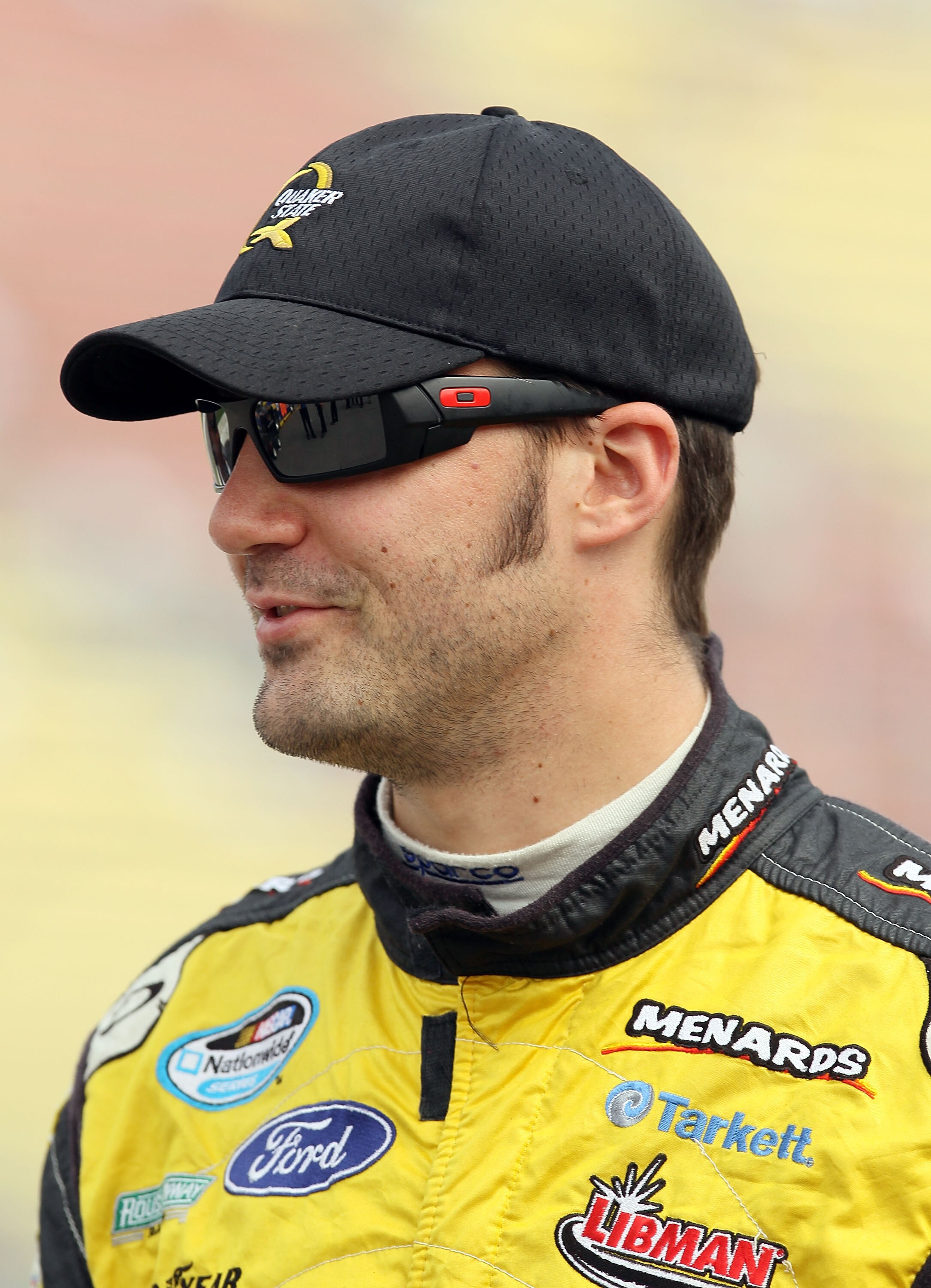 BROOKLYN, MI - AUGUST 14:  Paul Menard, driver of #98 the Richmond / Menards, looks on during qualifying for the NASCAR Nationwide Series CARFAX 250 at Michigan International Speedway on August 14, 2010 in Brooklyn, Michigan.  (Photo by Elsa/Getty Images)