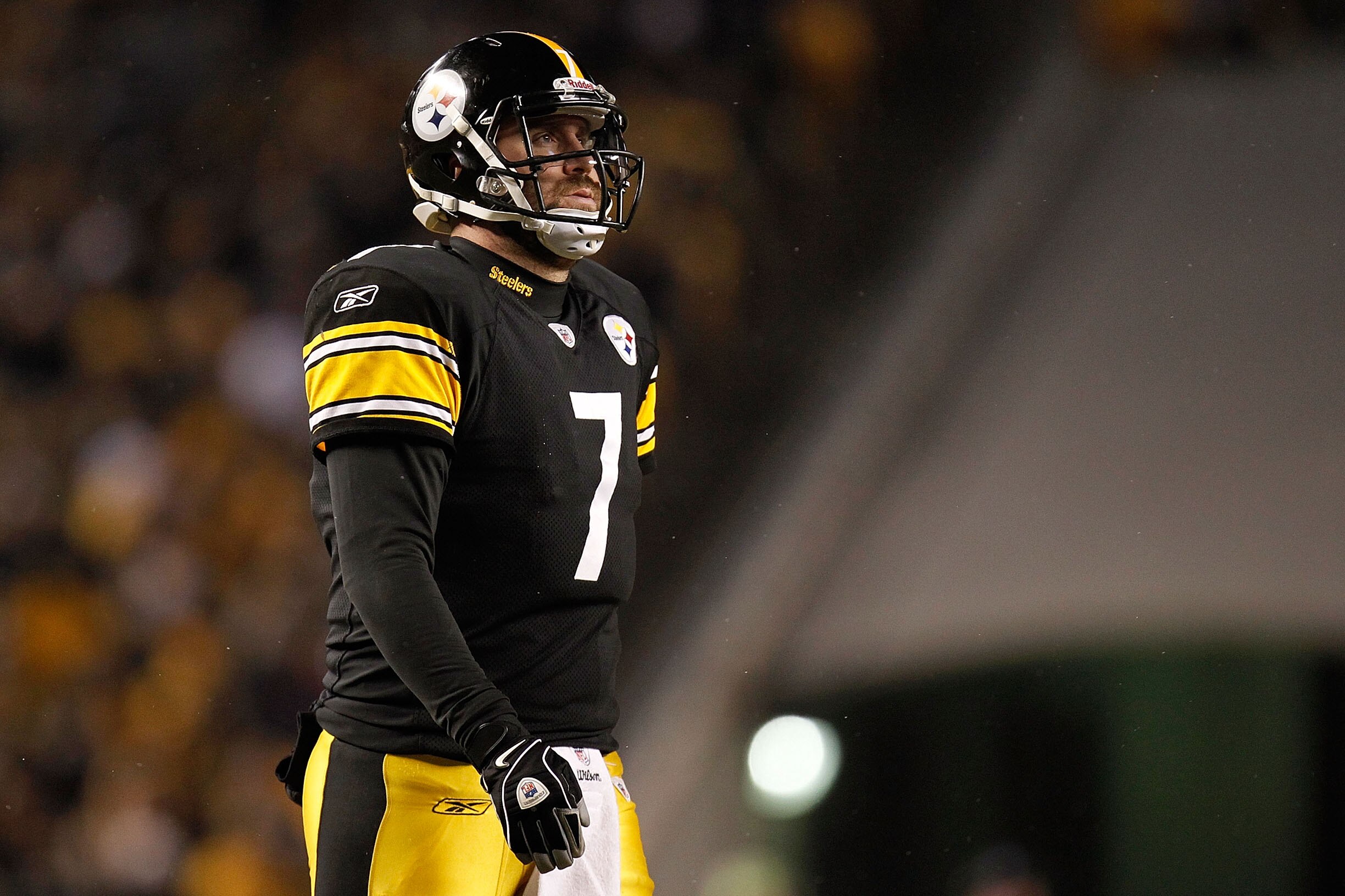 PITTSBURGH, PA - JANUARY 15:  Quarterback Ben Roethlisberger #7 of the Pittsburgh Steelers walks off the field against the Baltimore Ravens in the AFC Divisional Playoff Game at Heinz Field on January 15, 2011 in Pittsburgh, Pennsylvania.  (Photo by Grego