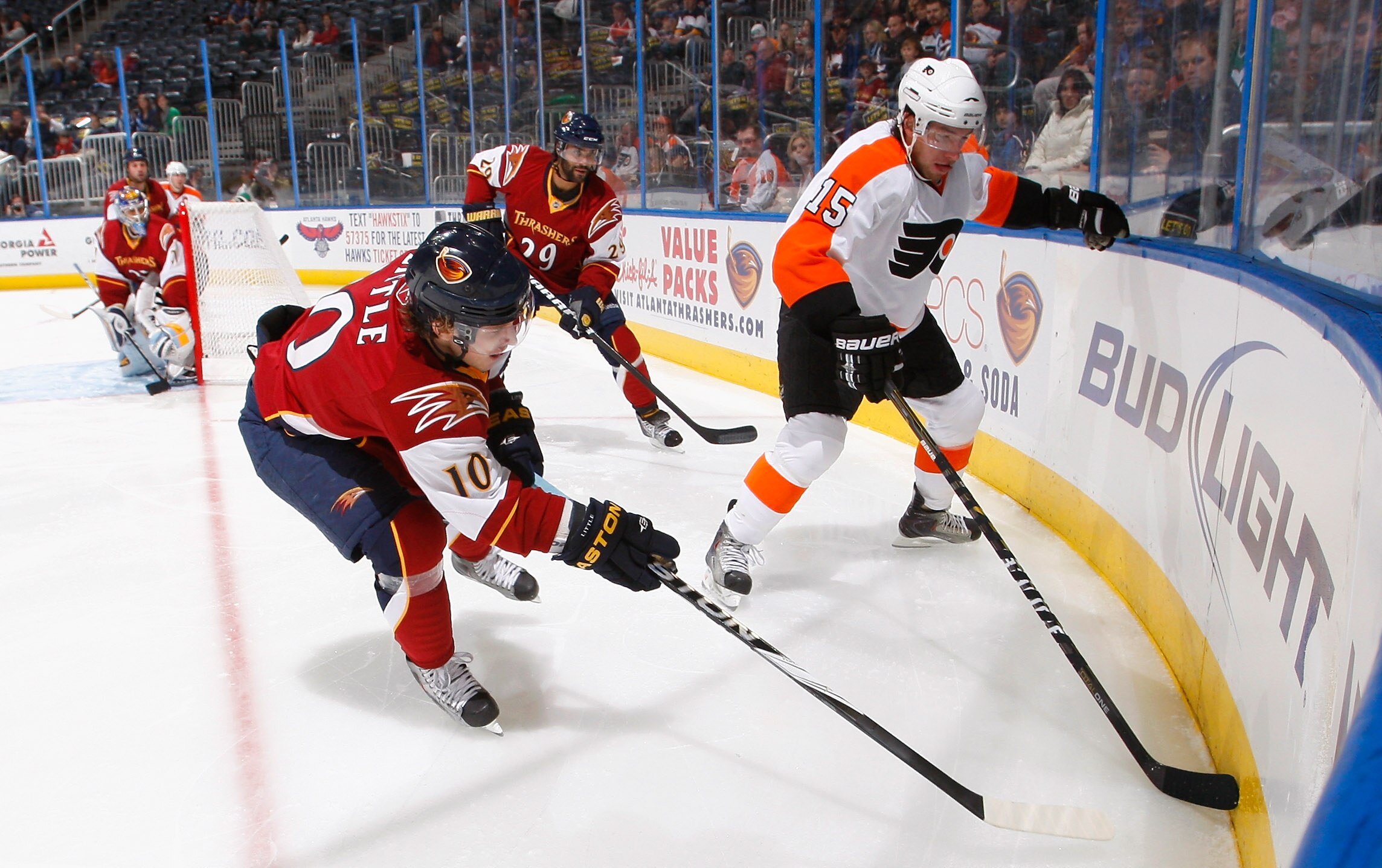 ATLANTA, GA - JANUARY 14:  Bryan Little #10 of the Atlanta Thrashers defends against Andreas Nodl #15 of the Philadelphia Flyers at Philips Arena on January 14, 2011 in Atlanta, Georgia.  (Photo by Kevin C. Cox/Getty Images)