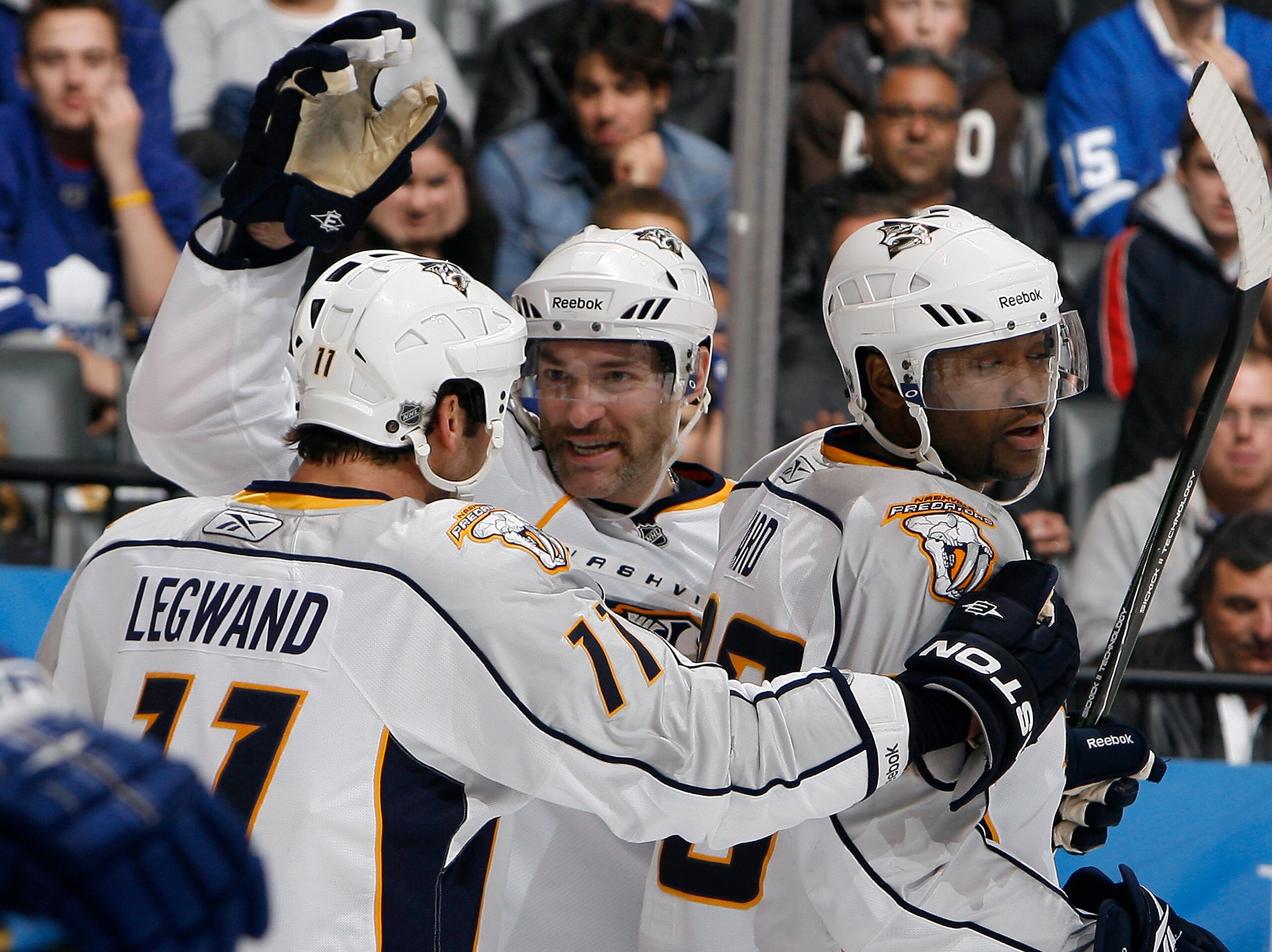 TORONTO - NOVEMBER 16: David Legwand #11, J.P. Dumont #71 and Joel Ward #29 of the Nashville Predators celebrate J.P. Dumont's goal during game action against the Toronto Maple Leafs at the Air Canada Centre November 16, 2010 in Toronto, Ontario, Canada.