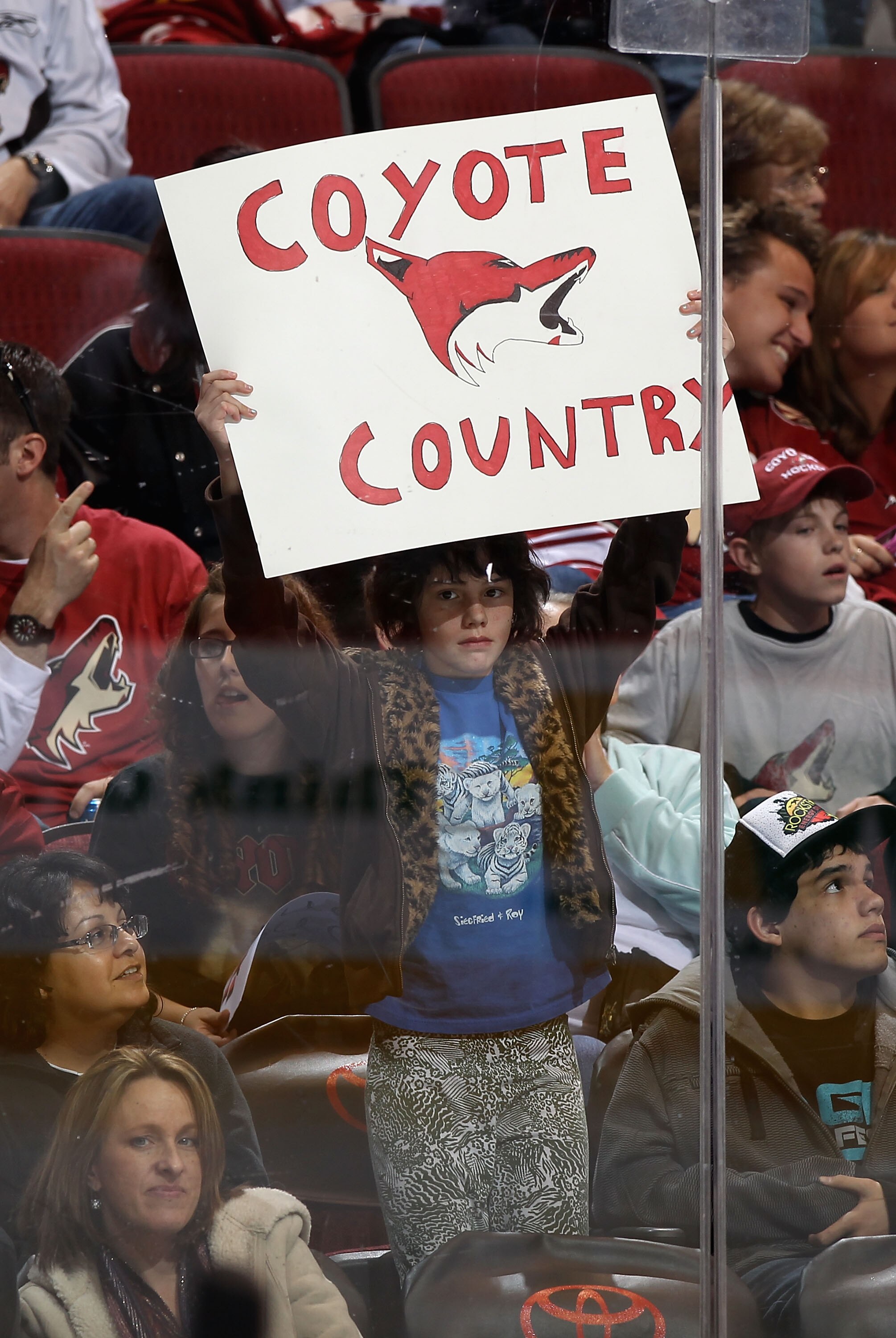 GLENDALE, AZ - JANUARY 15:  A fan of the Phoenix Coyotes holds up a sign during the NHL game against the Anaheim Ducks at Jobing.com Arena on January 15, 2011 in Glendale, Arizona. The Coyotes defeated the Ducks 6-2.  (Photo by Christian Petersen/Getty Im