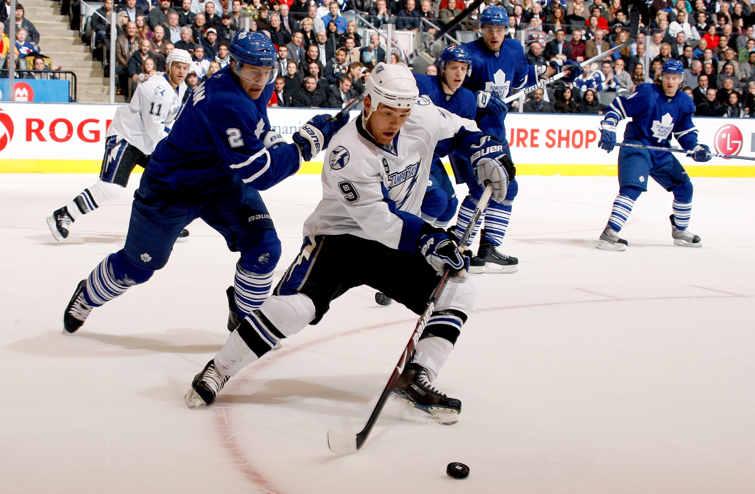 TORONTO - NOVEMBER 3: Luke Schenn #2 of the Toronto Maple Leafs tracks down Steve Downie #9 of the Tampa Bay Lightning during a NHL game at the Air Canada Centre on November 3, 2009 in Toronto, Ontario, Canada . (Photo by Abelimages/Getty Images) TORONTO - NOVEMBER 3: Luke Schenn #2 of the Toronto Maple Leafs tracks down Steve Downie #9 of the Tampa Bay Lightning during a NHL game at the Air Canada Centre on November 3, 2009 in Toronto, Ontario, Canada . (Photo by Abelimages/Getty Images)