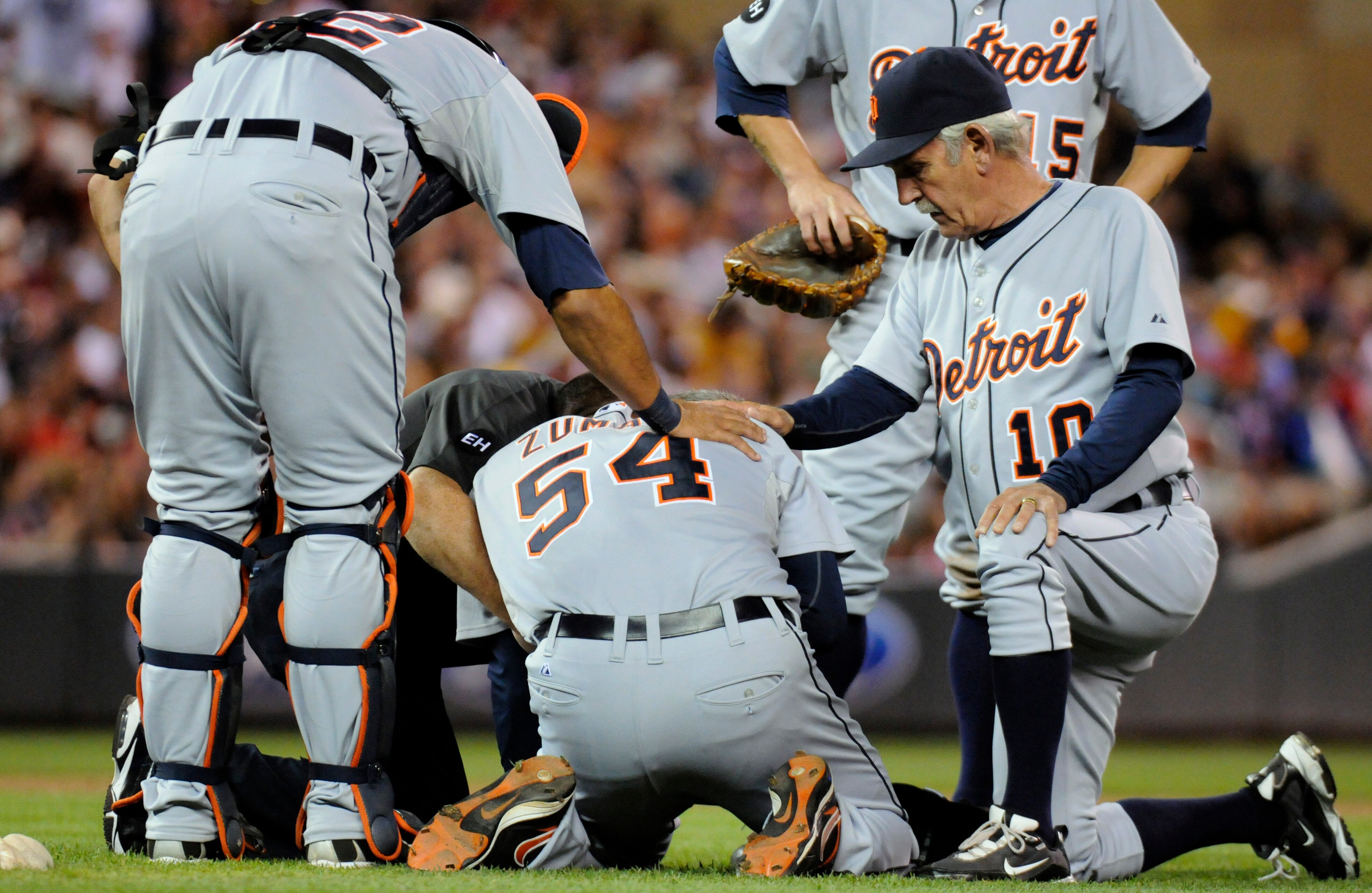 MINNEAPOLIS, MN - JUNE 28: Manager Jim Leyland #10 speaks with Joel Zumaya #54 of the Detroit Tigers who clutched his elbow after falling to the ground in the eighth inning against the Minnesota Twins during their game on June 28, 2010 at Target Field in MINNEAPOLIS, MN - JUNE 28: Manager Jim Leyland #10 speaks with Joel Zumaya #54 of the Detroit Tigers who clutched his elbow after falling to the ground in the eighth inning against the Minnesota Twins during their game on June 28, 2010 at Target Field in