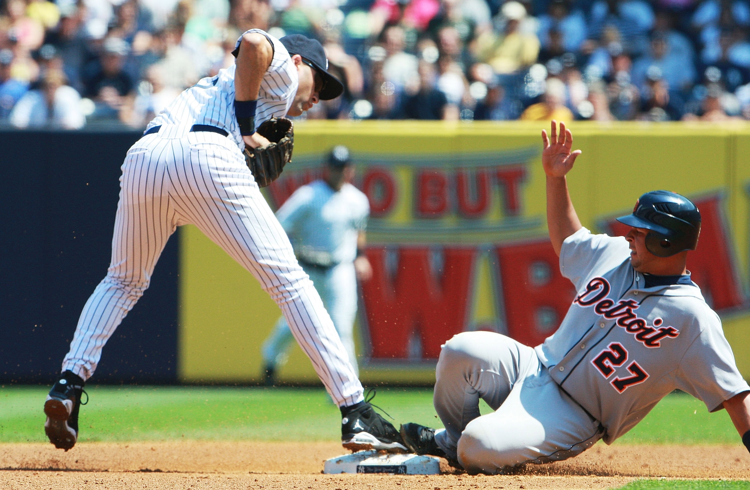 NEW YORK - AUGUST 19: Jhonny Peralta #27 of the Detroit Tigers slides safely into second base against Derek Jeter #2 of the New York Yankees in the second inning at Yankee Stadium on August 19, 2010 in the Bronx borough of New York City. (Photo by Andrew NEW YORK - AUGUST 19: Jhonny Peralta #27 of the Detroit Tigers slides safely into second base against Derek Jeter #2 of the New York Yankees in the second inning at Yankee Stadium on August 19, 2010 in the Bronx borough of New York City. (Photo by Andrew