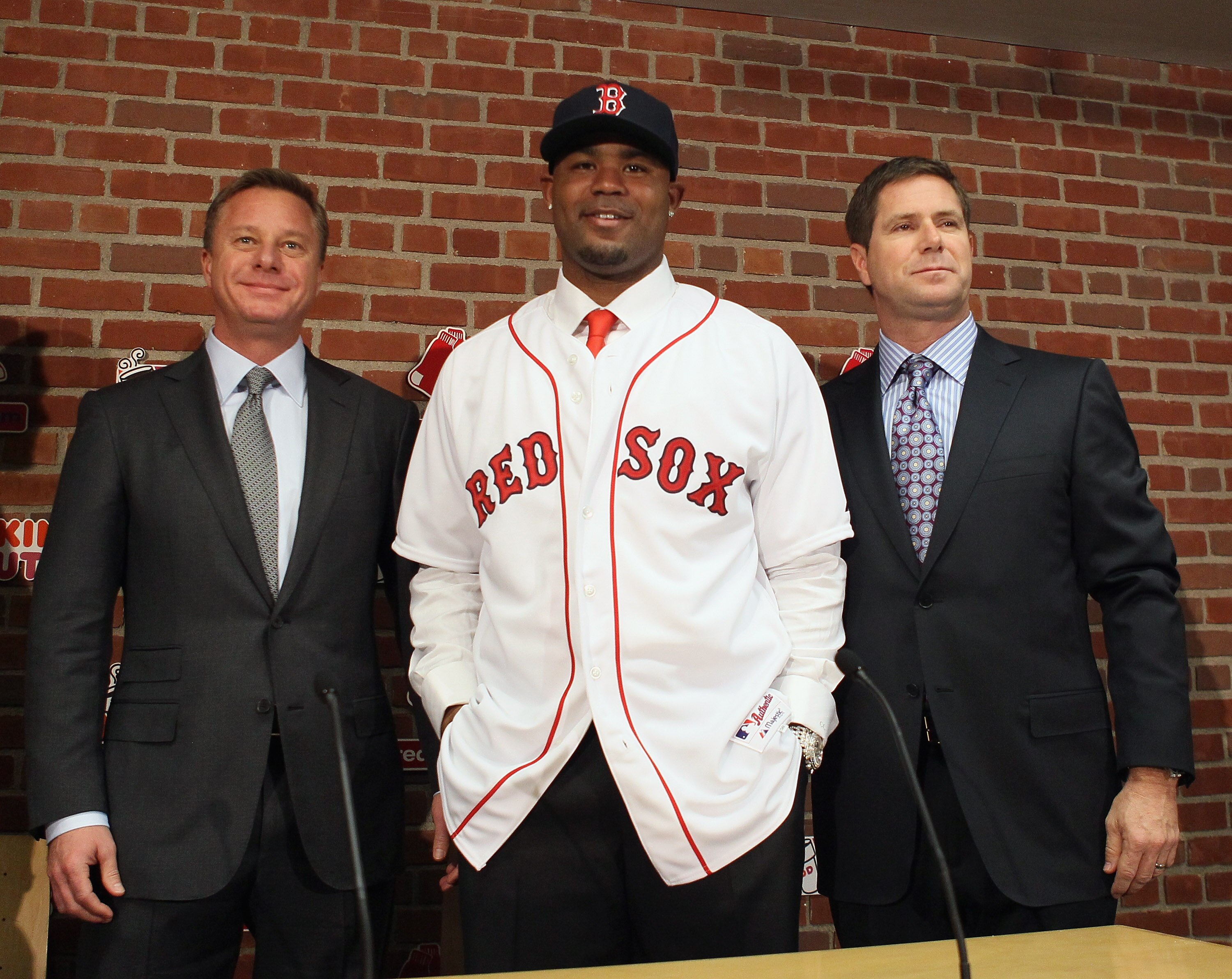 BOSTON, MA - DECEMBER 11: Carl Crawford poses with his agents during a press conference announcing his signing with the Boston Red Sox on December 11, 2010 at the Fenway Park in Boston, Massachusetts. (Photo by Elsa/Getty Images) BOSTON, MA - DECEMBER 11: Carl Crawford poses with his agents during a press conference announcing his signing with the Boston Red Sox on December 11, 2010 at the Fenway Park in Boston, Massachusetts. (Photo by Elsa/Getty Images)
