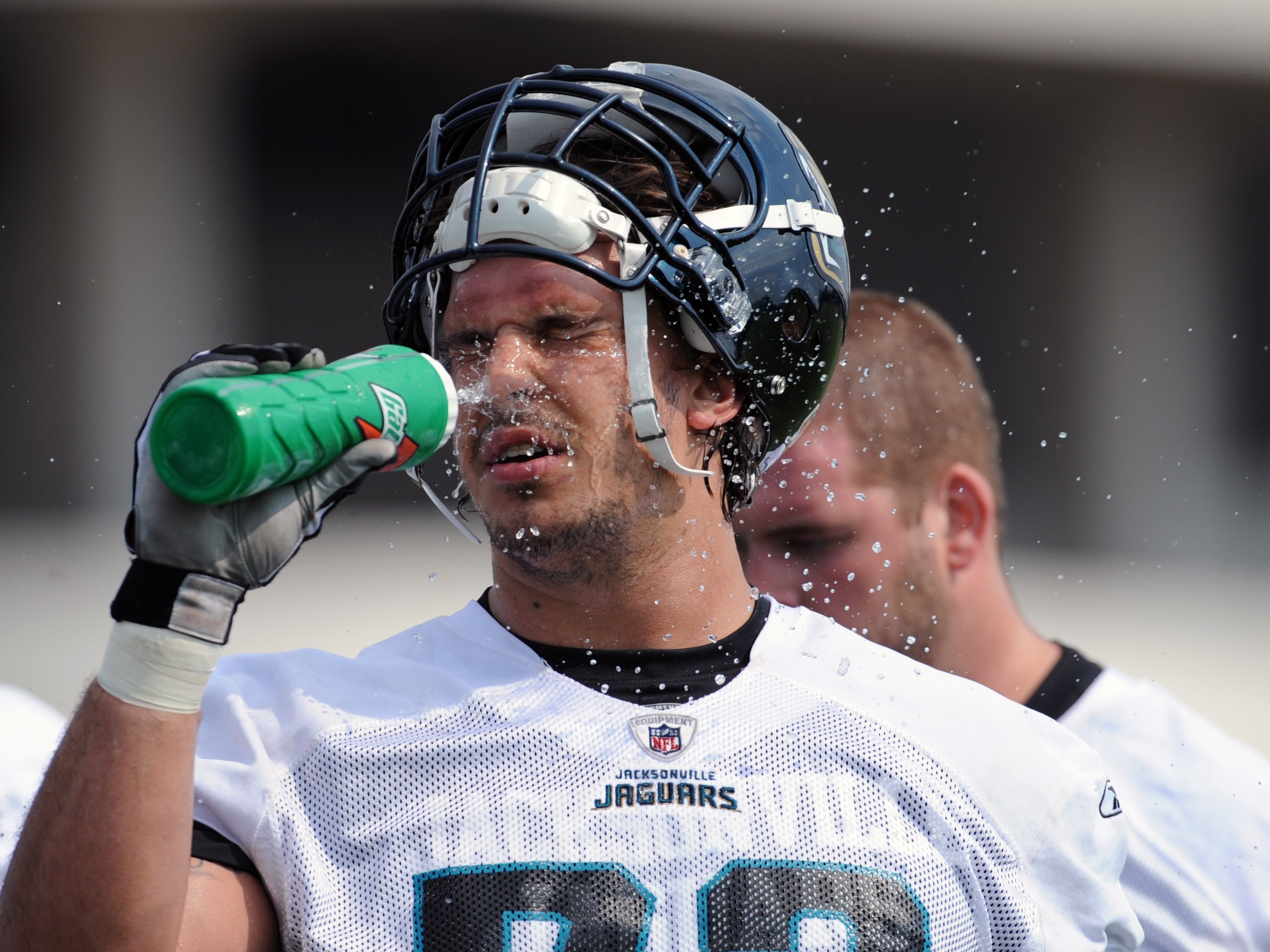 JACKSONVILLE, FL - MAY 1:  Tackle Eben Britton #73 of the Jacksonville Jaguars seeks relief from the heat during a team mini-camp on May 1, 2009 on the practice fields at Jacksonville Municipal Stadium in Jacksonville, Florida.  (Photo by Al Messerschmidt