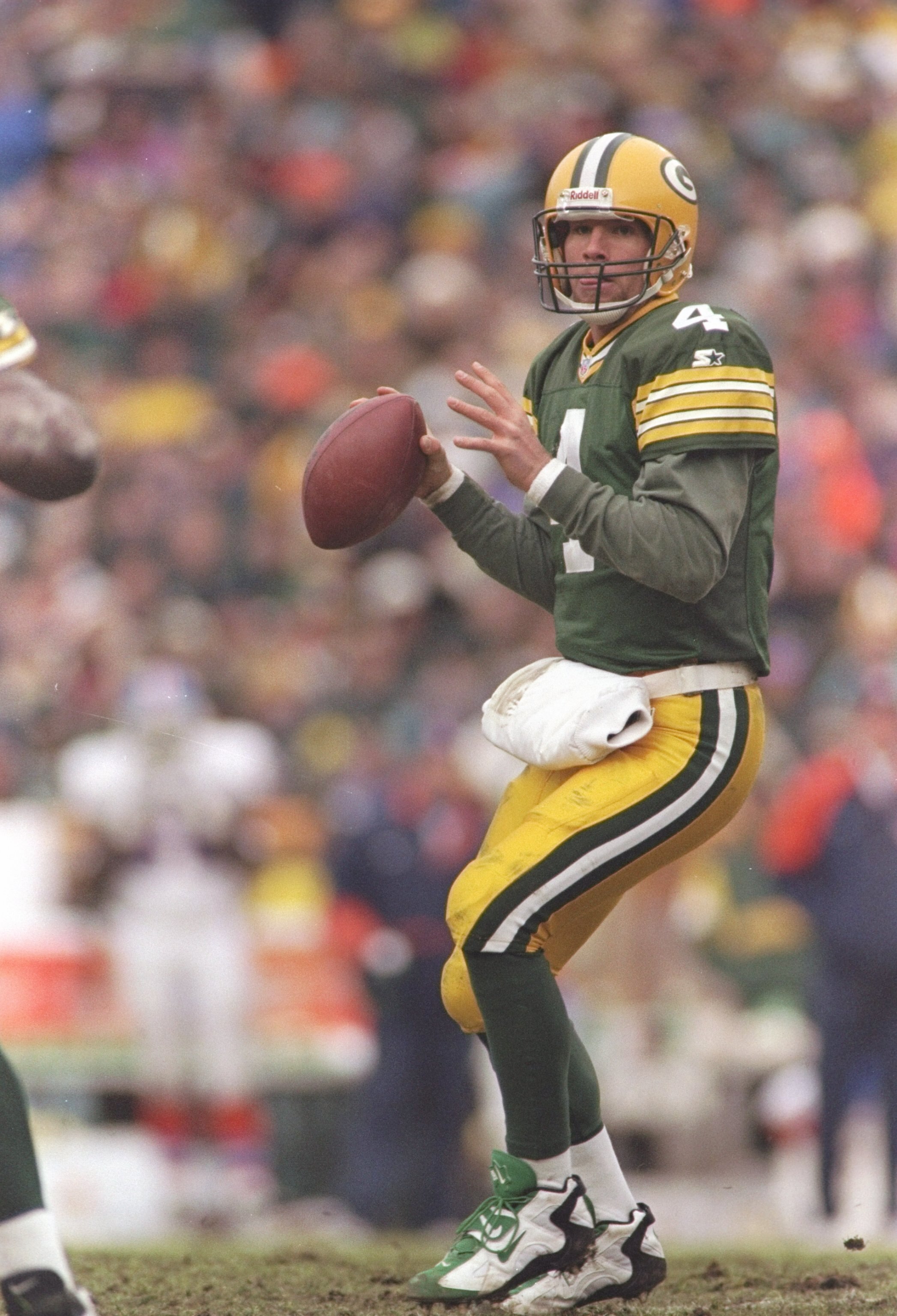 8 Dec 1996:  Quarterback Brett Favre of the Green Bay Packers drops back to pass during a game against the Denver Broncos at Lambeau Field in Green Bay, Wisconsin.  The Packers won the game 41-6. Mandatory Credit: Brian Bahr  /Allsport
