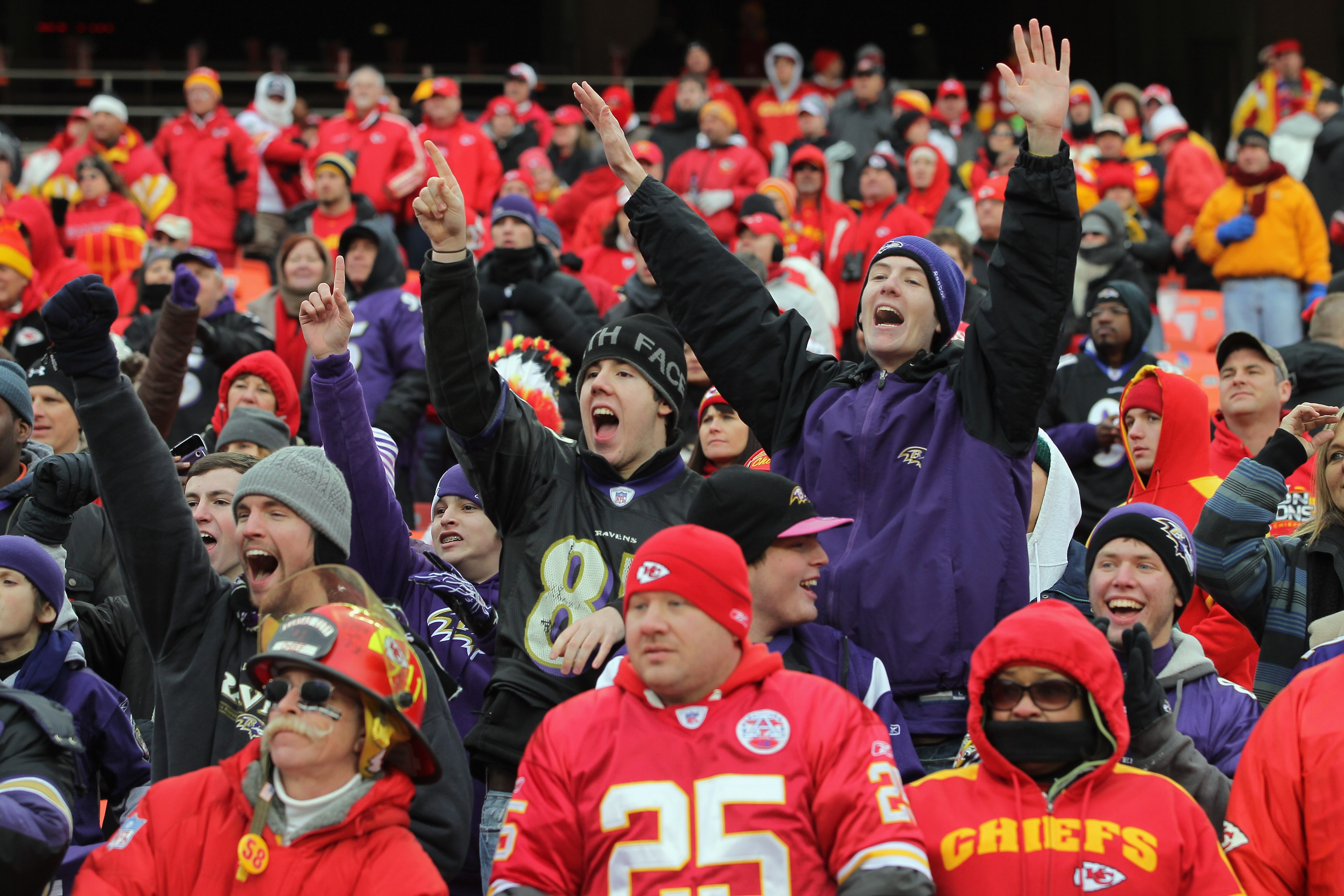 KANSAS CITY, MO - JANUARY 09:  Fans of the Baltimore Ravens celebrate in the stands in the final minutes as the Ravens defeated the Kansas City Chiefs 30-7 in the 2011 AFC wild card playoff game at Arrowhead Stadium on January 9, 2011 in Kansas City, Miss