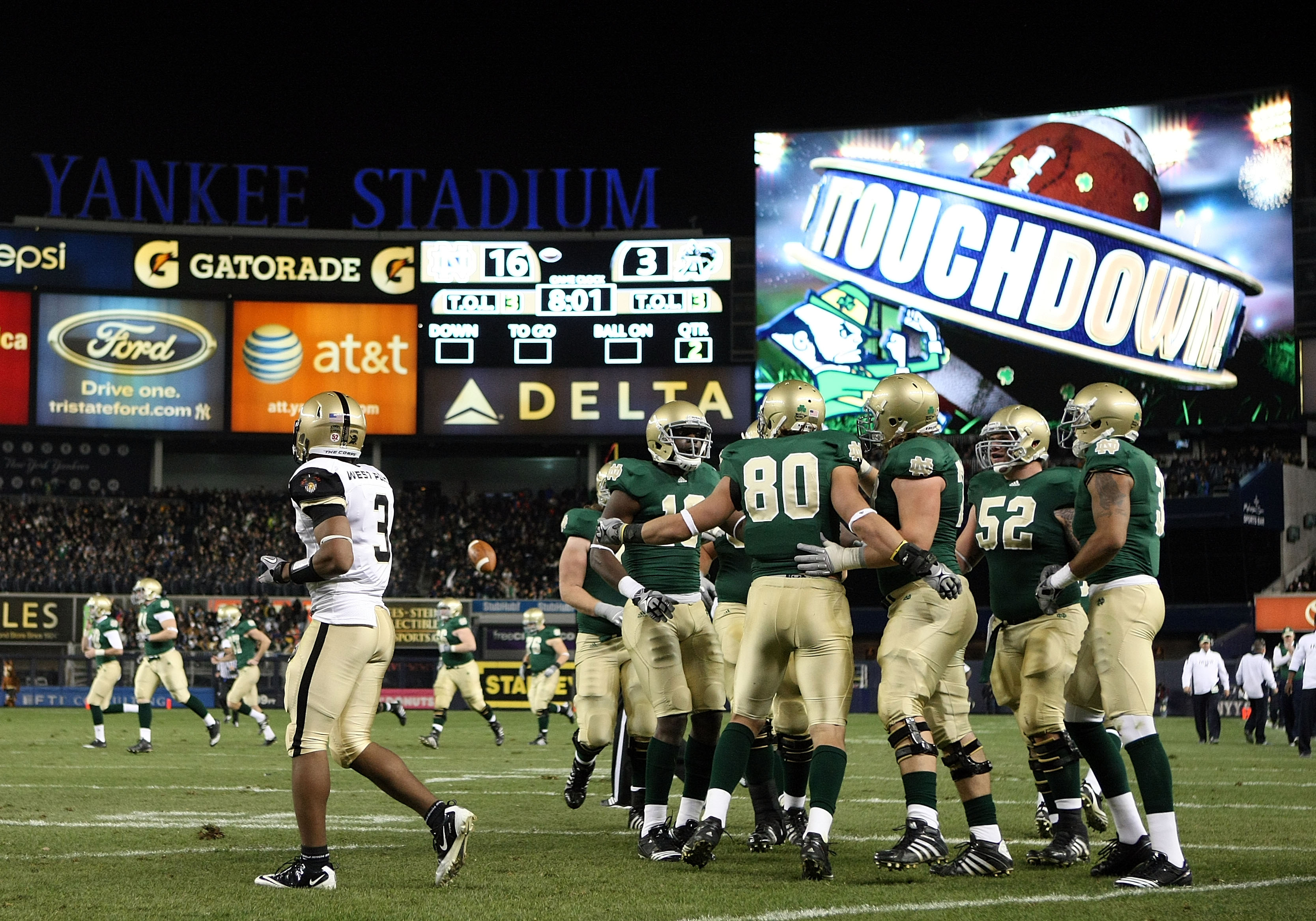 NEW YORK - NOVEMBER 20: The Notre Dame Fighting Irish celebrate a touchdown by Tyler Eifert #80 against the Army Black Knights at Yankee Stadium on November 20, 2010 in the Bronx borough of New York City.  (Photo by Nick Laham/Getty Images)