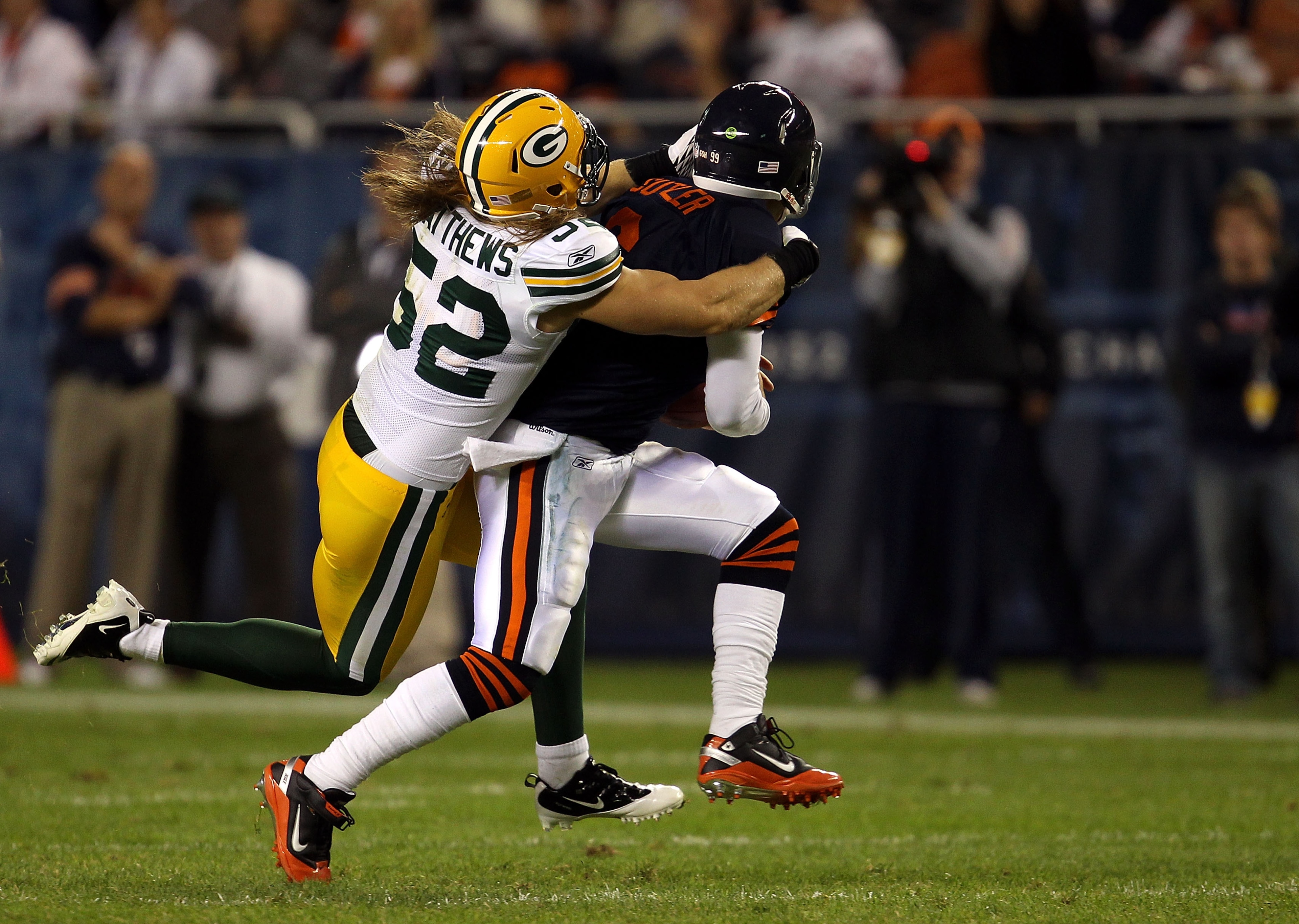CHICAGO - SEPTEMBER 27: Clay Matthews #52 of the Green Bay Packers is called for a facemask as he pulls down Jay Cutler #6 of the Chicago Bears in the first quarter at Soldier Field on September 27, 2010 in Chicago, Illinois. The Bears won 20-17. (Photo CHICAGO - SEPTEMBER 27: Clay Matthews #52 of the Green Bay Packers is called for a facemask as he pulls down Jay Cutler #6 of the Chicago Bears in the first quarter at Soldier Field on September 27, 2010 in Chicago, Illinois. The Bears won 20-17. (Photo