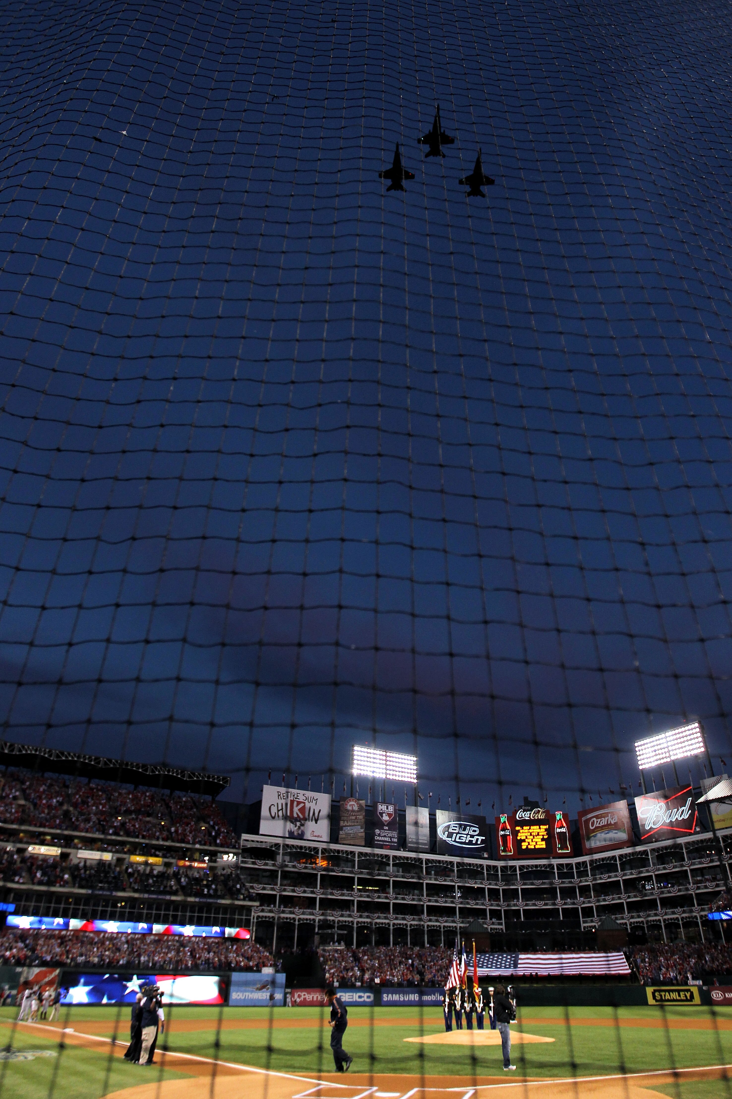 ARLINGTON, TX - NOVEMBER 01:  Jets perform a fly over during the performance of the National Anthem prior to the Texas Rangers playing against the San Francisco Giants in Game Five of the 2010 MLB World Series at Rangers Ballpark in Arlington on November