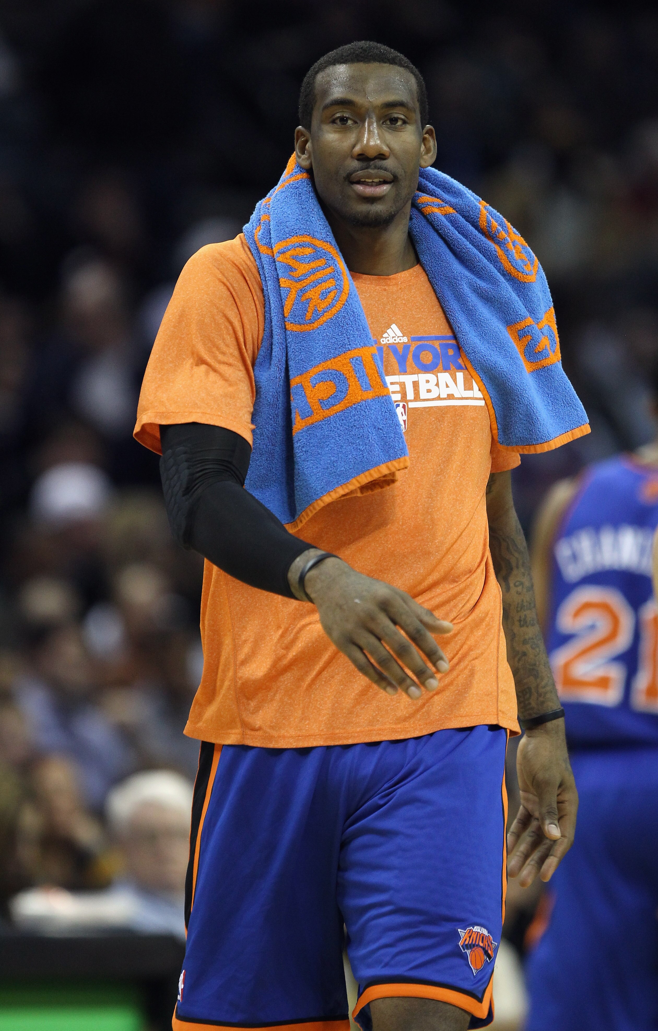 CHARLOTTE, NC - NOVEMBER 24:  Amare Stoudemire #1 of the New York Knicks supports his teammates as he walks on the court during his game against the Charlotte Bobcats at Time Warner Cable Arena on November 24, 2010 in Charlotte, North Carolina.  NOTE TO U