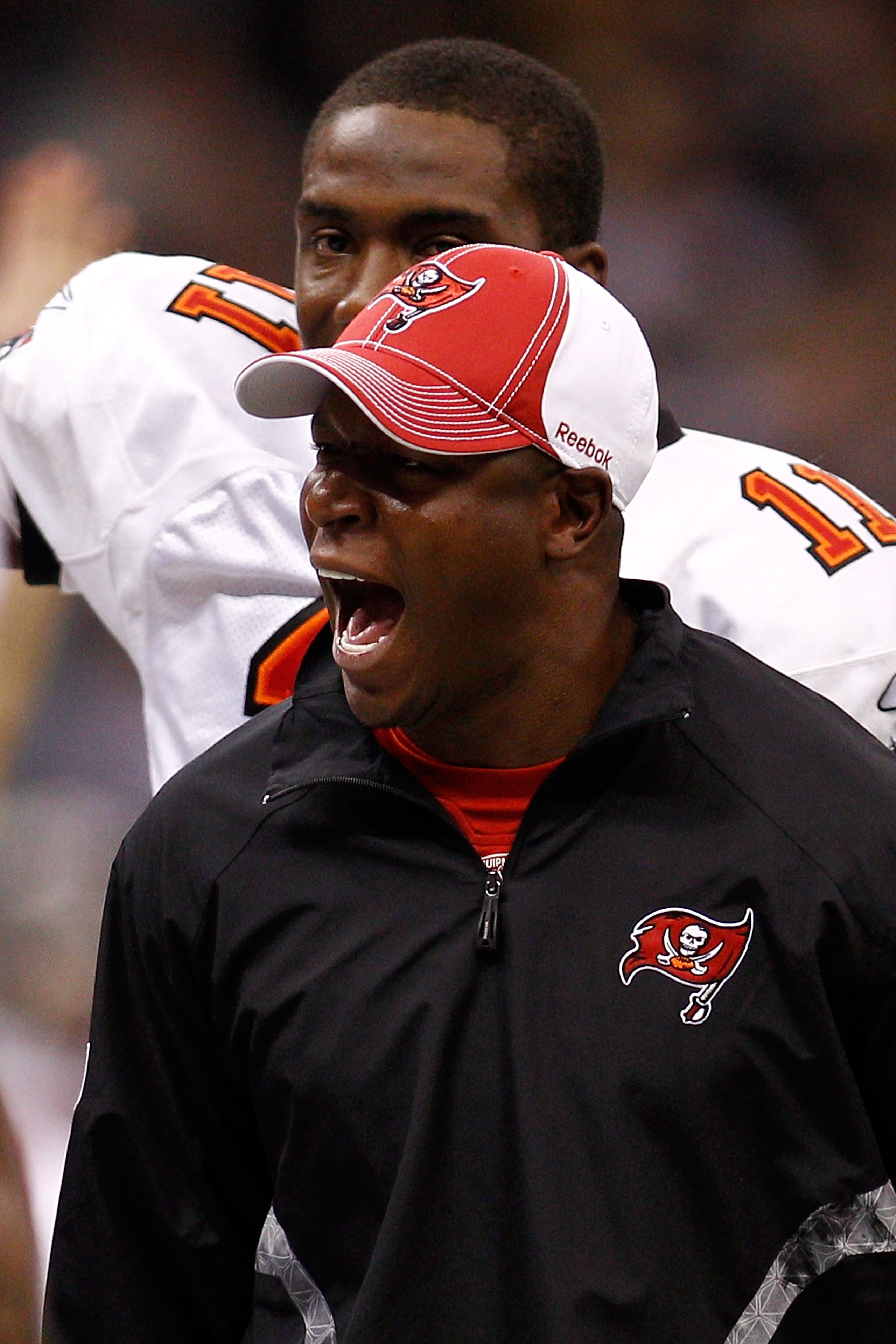 NEW ORLEANS, LA - JANUARY 02: Head coach Raheem Morris of the Tampa Bay Buccaneers celebrates after a touchdown during the game against the New Orleans Saintsat the Louisiana Superdome on January 2, 2011 in New Orleans, Louisiana. (Photo by Chris Grayth NEW ORLEANS, LA - JANUARY 02: Head coach Raheem Morris of the Tampa Bay Buccaneers celebrates after a touchdown during the game against the New Orleans Saintsat the Louisiana Superdome on January 2, 2011 in New Orleans, Louisiana. (Photo by Chris Grayth