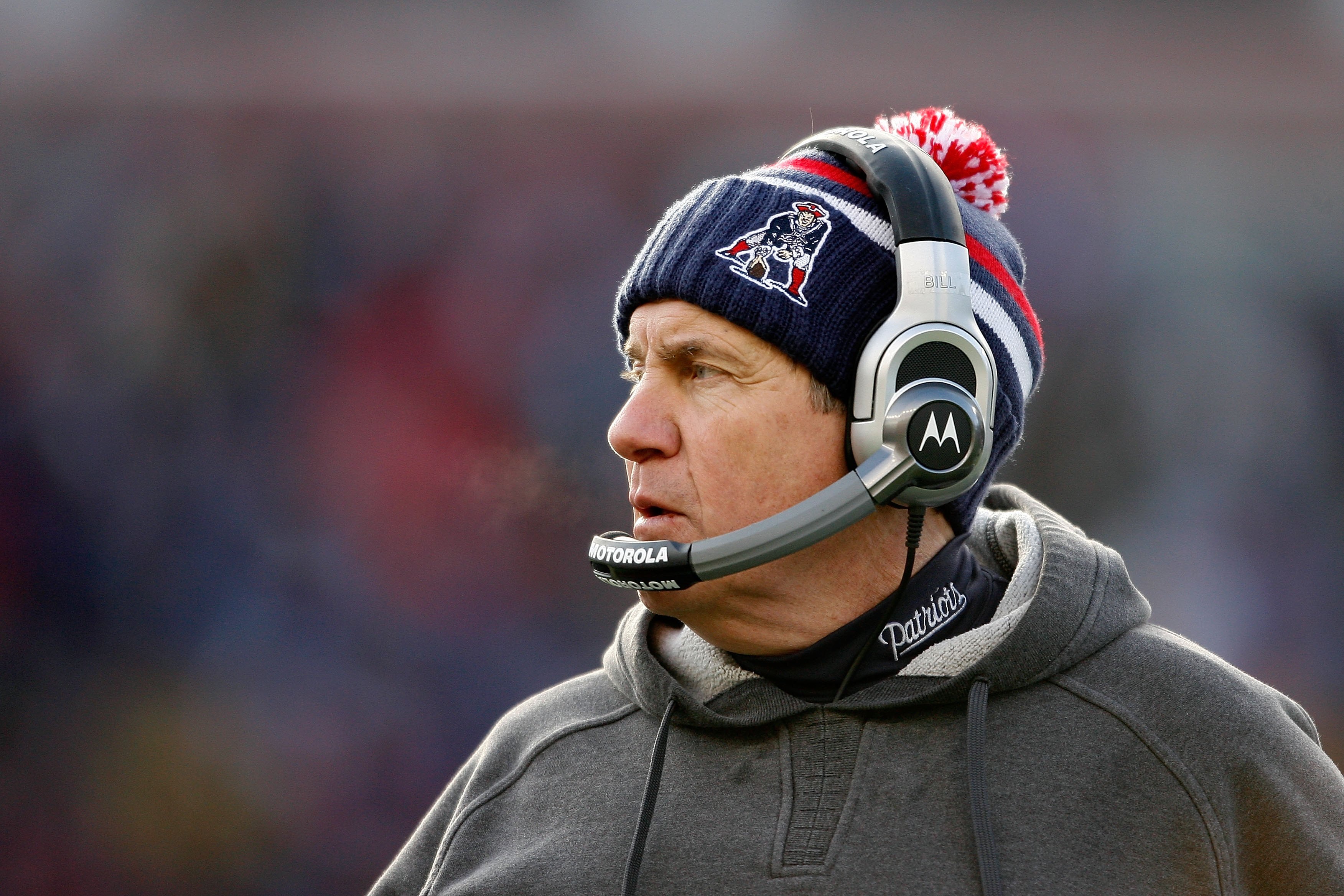 FOXBORO, MA - JANUARY 10:  Head coach Bill Belichick of the New England Patriots looks on against the Baltimore Ravens during the 2010 AFC wild-card playoff game at Gillette Stadium on January 10, 2010 in Foxboro, Massachusetts.  (Photo by Elsa/Getty Imag