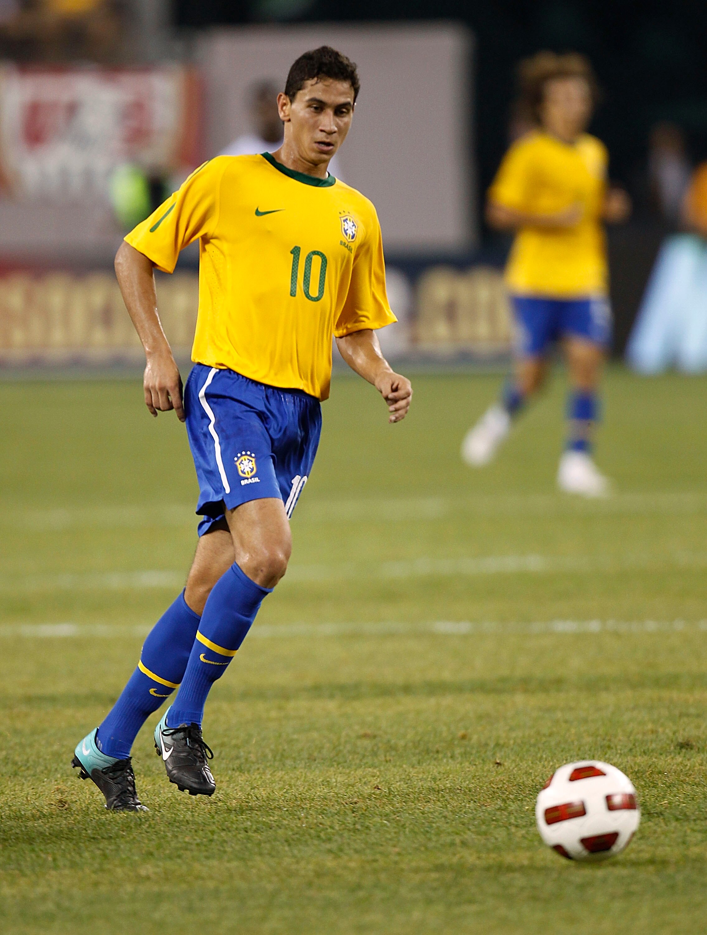 EAST RUTHERFORD, NJ - AUGUST 10: Paulo Henrique Ganso #10 of Brazil runs upfield in the first half of a friendly match against the U.S. at the New Meadowlands on August 10, 2010 in East Rutherford, New Jersey. (Photo by Jeff Zelevansky/Getty Images)