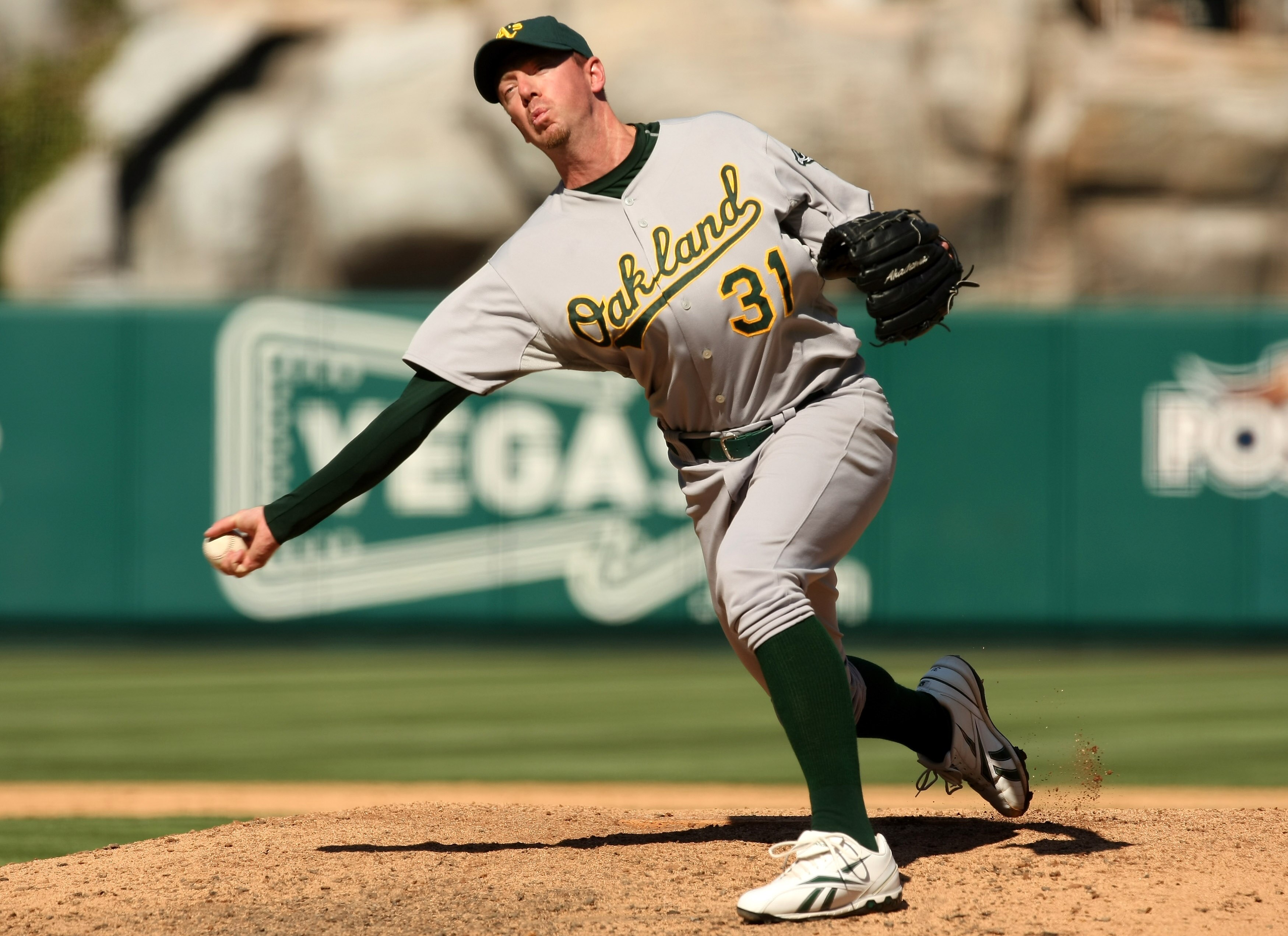 ANAHEIM, CA - SEPTEMBER 27: Pitcher Brad Ziegler #31 of the Oakland Athletics throws a pitch against the Los Angeles Angels of Anaheim on September 27, 2009 at Angel Stadium in Anaheim, California.   The Angels won 7-4. (Photo by Stephen Dunn/Getty Images