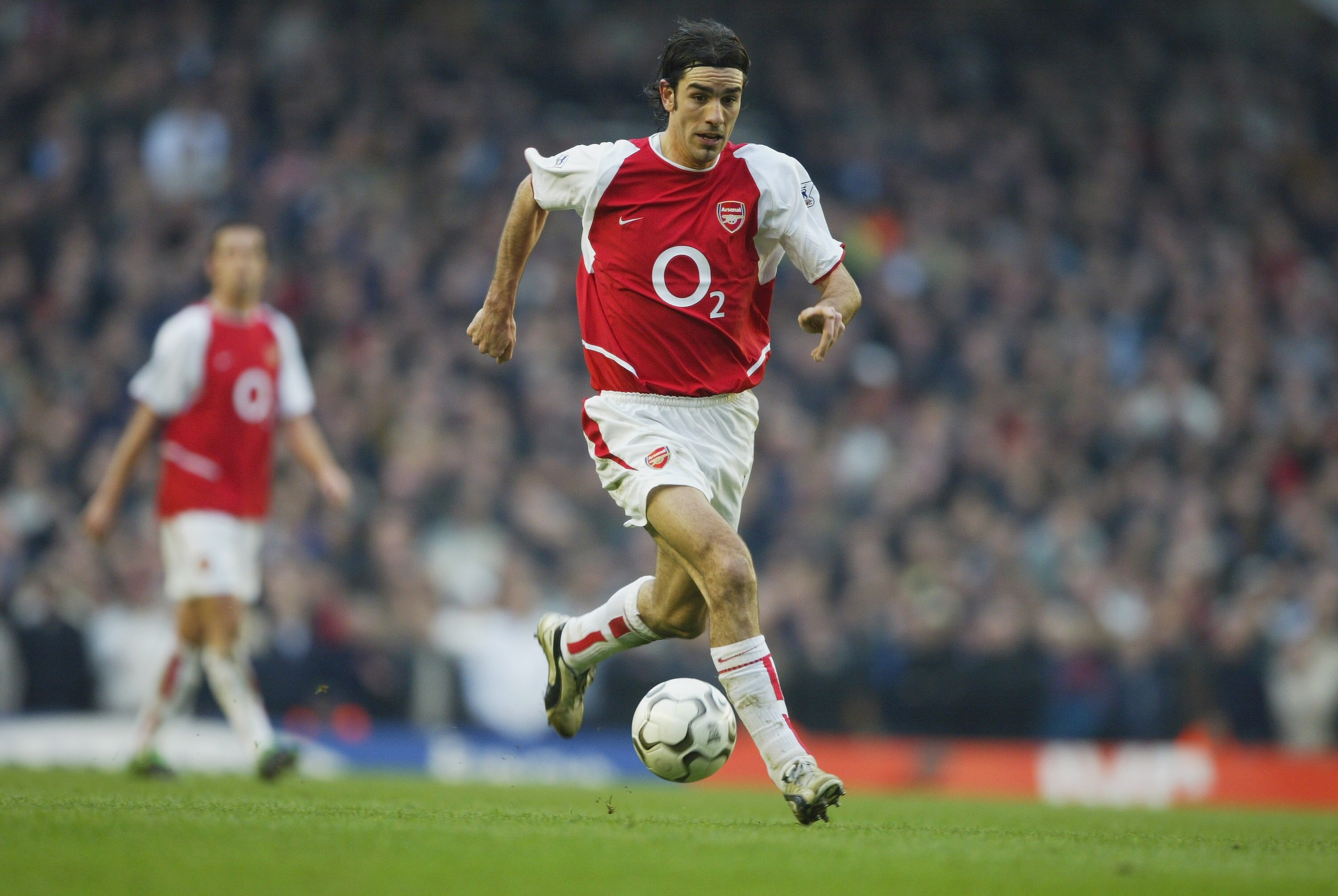 LONDON - MARCH 28:  Robert Pires of Arsenal during the FA Barclaycard Premiership match between Arsenal and Manchester United at Highbury on March 28, 2004 in London.  (Photo by Clive Mason/Getty Images)