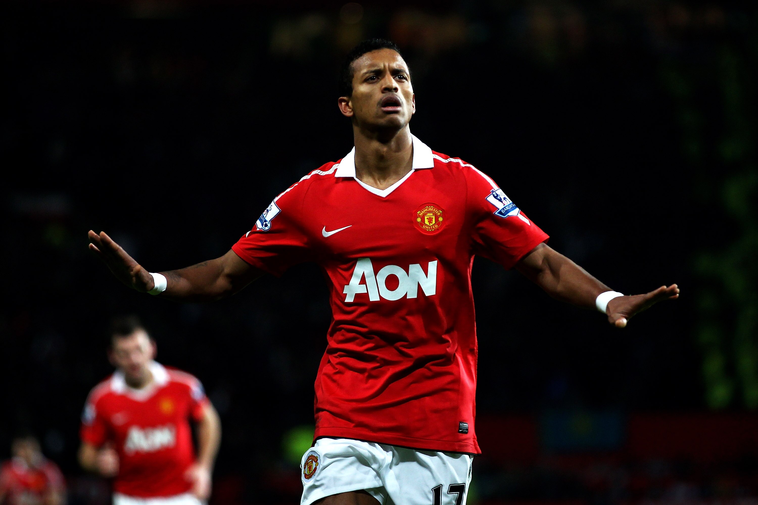 MANCHESTER, ENGLAND - JANUARY 04:  Nani of Manchester United celebrates scoring his team's second goal during the Barclays Premier League match between Manchester United and Stoke City at Old Trafford on January 4, 2011 in Manchester, England.  (Photo by