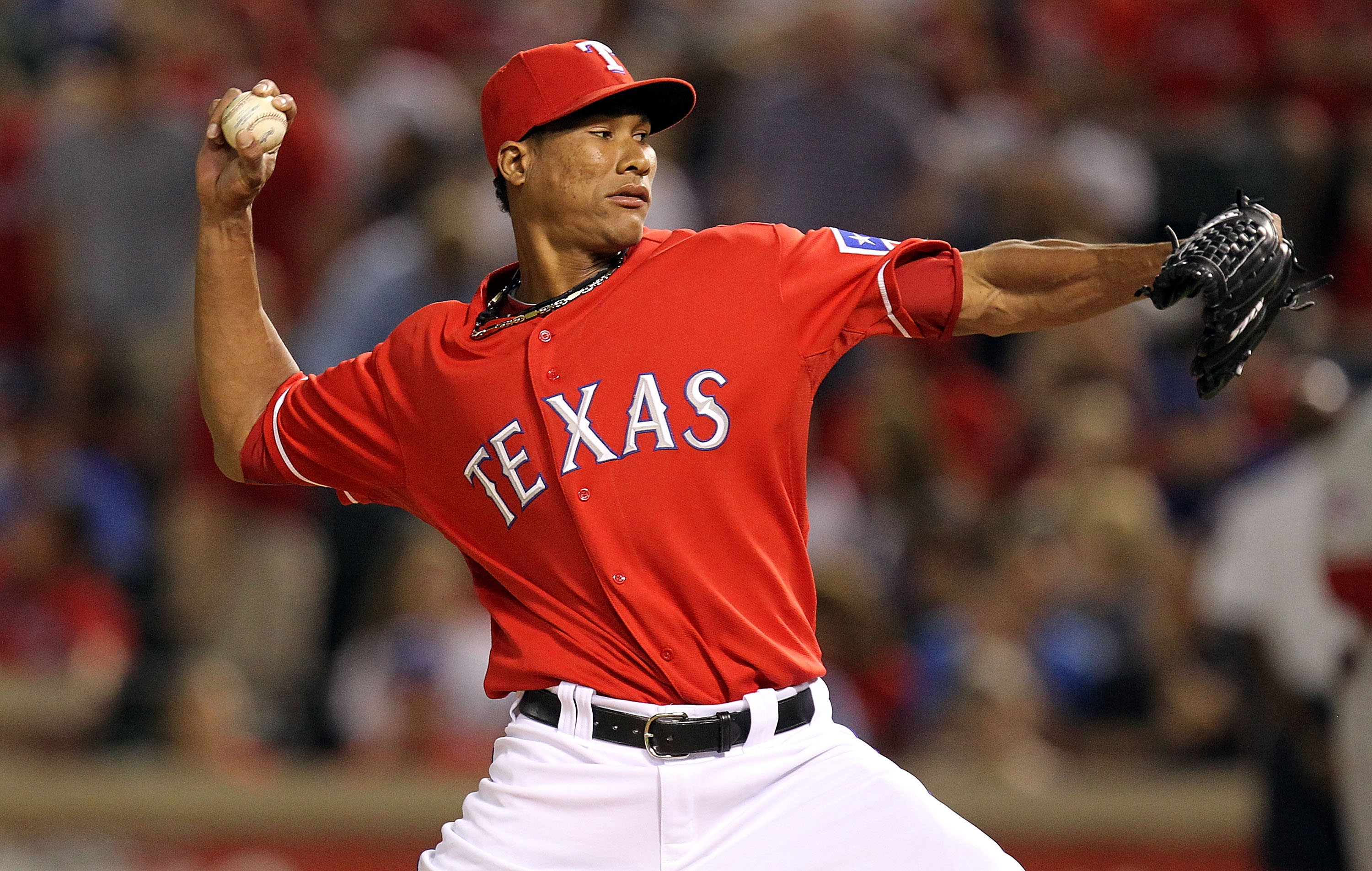 ARLINGTON, TX - OCTOBER 01:  Pitcher Alexi Ogando #64 of the Texas Rangers at Rangers Ballpark in Arlington on October 1, 2010 in Arlington, Texas.  (Photo by Ronald Martinez/Getty Images)