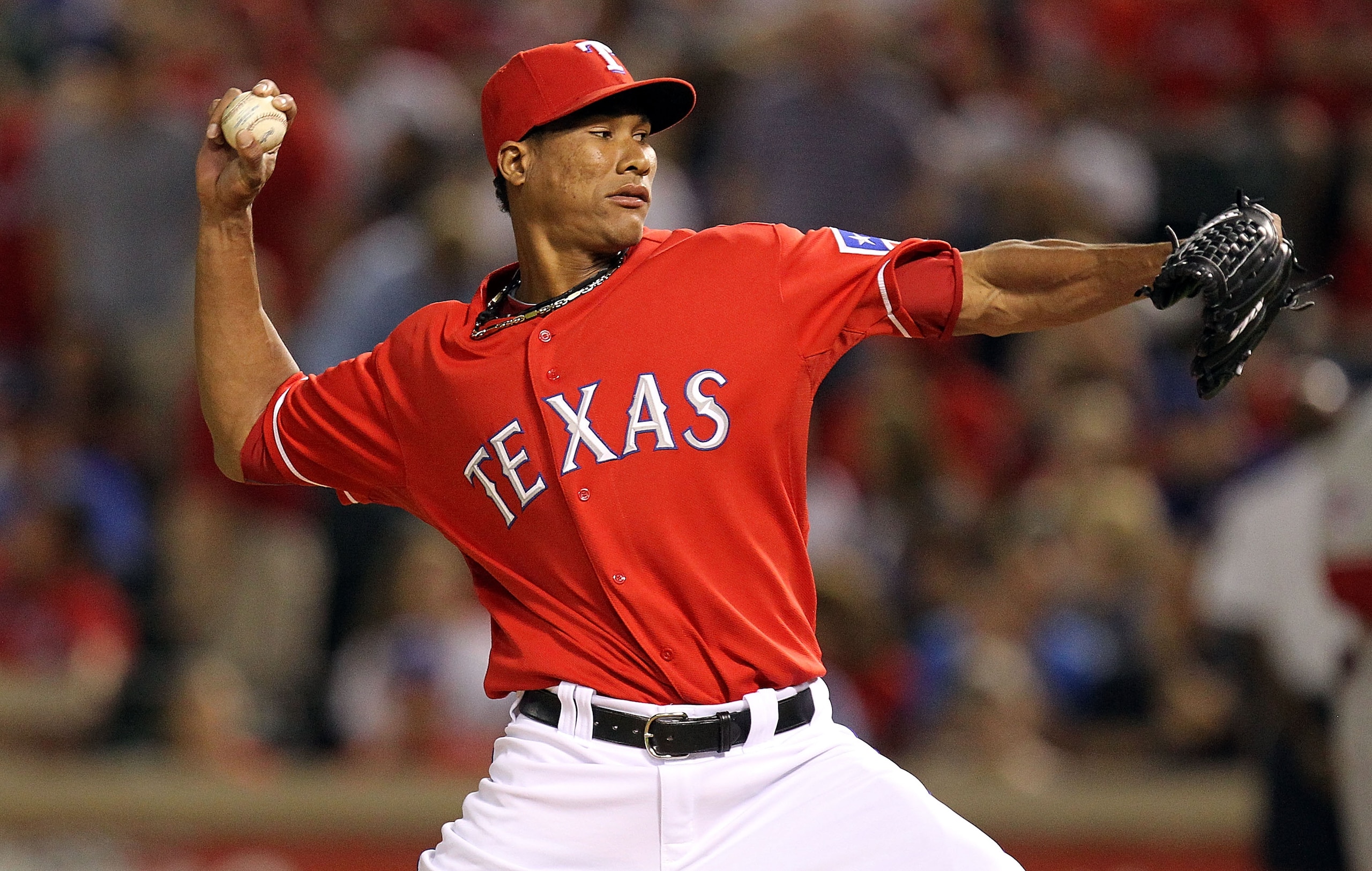 ARLINGTON, TX - OCTOBER 01:  Pitcher Alexi Ogando #64 of the Texas Rangers at Rangers Ballpark in Arlington on October 1, 2010 in Arlington, Texas.  (Photo by Ronald Martinez/Getty Images)