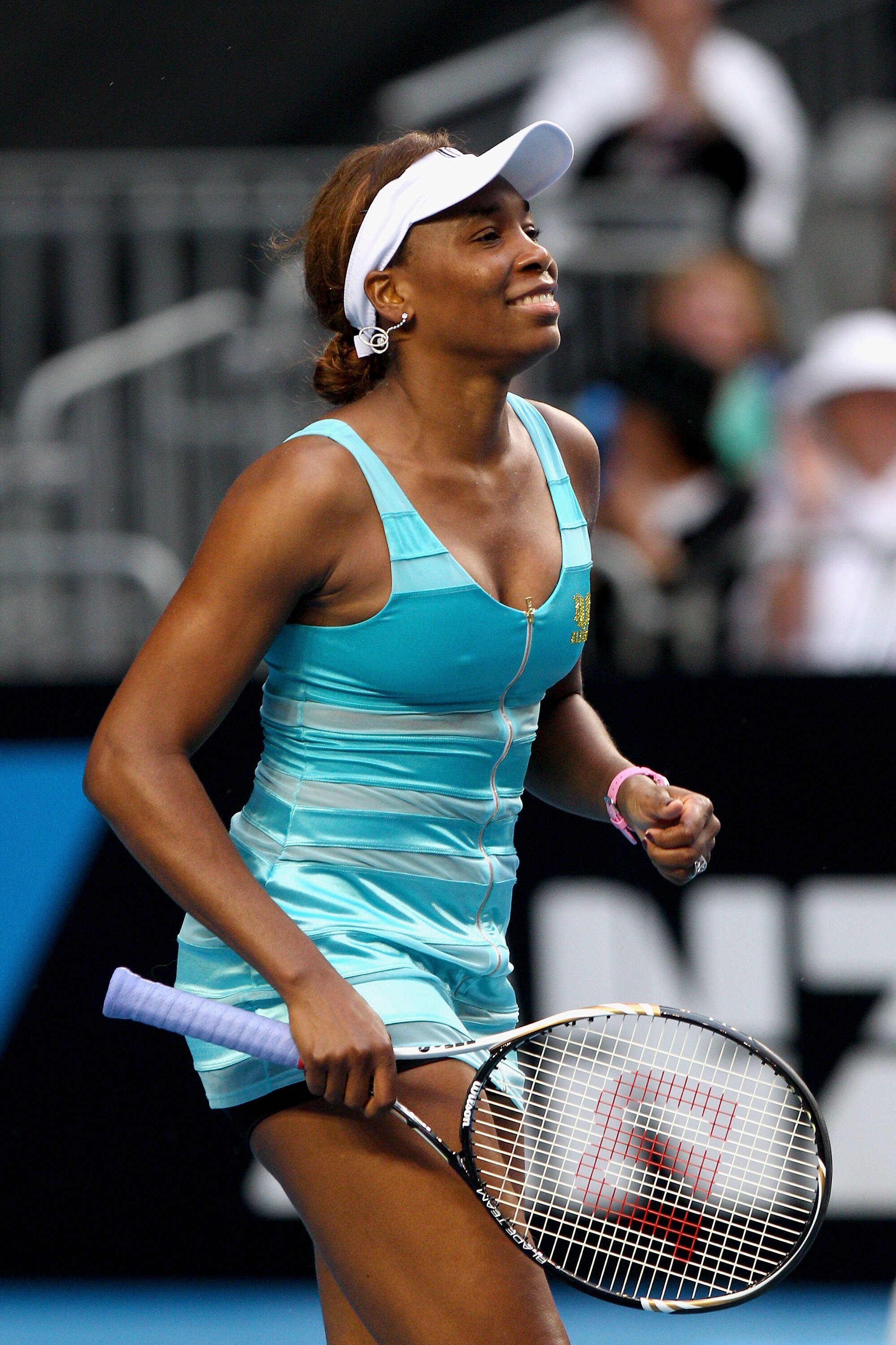 MELBOURNE, AUSTRALIA - JANUARY 17:  Venus Williams of the United States of America celebrates winning her first round match against Sara Errani of Italy during day one of the 2011 Australian Open at Melbourne Park on January 17, 2011 in Melbourne, Austral