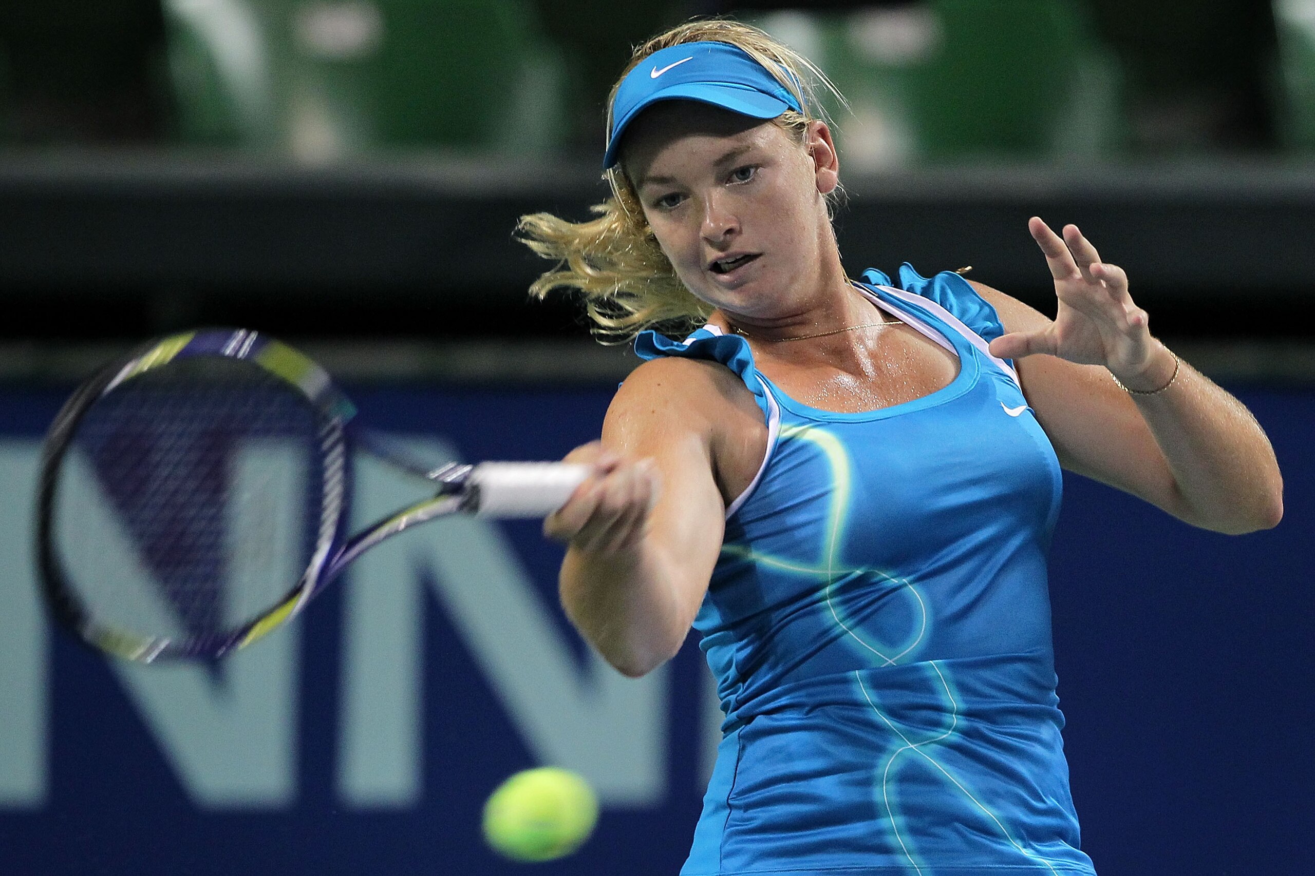 TOKYO - SEPTEMBER 30:  Coco Vandeweghe of the United States plays a forehand in her match against Victoria Azarenka of Belarus on day five of the Toray Pan Pacific Open tennis tournament at Ariake Colosseum on September 30, 2010 in Tokyo, Japan.  (Photo b