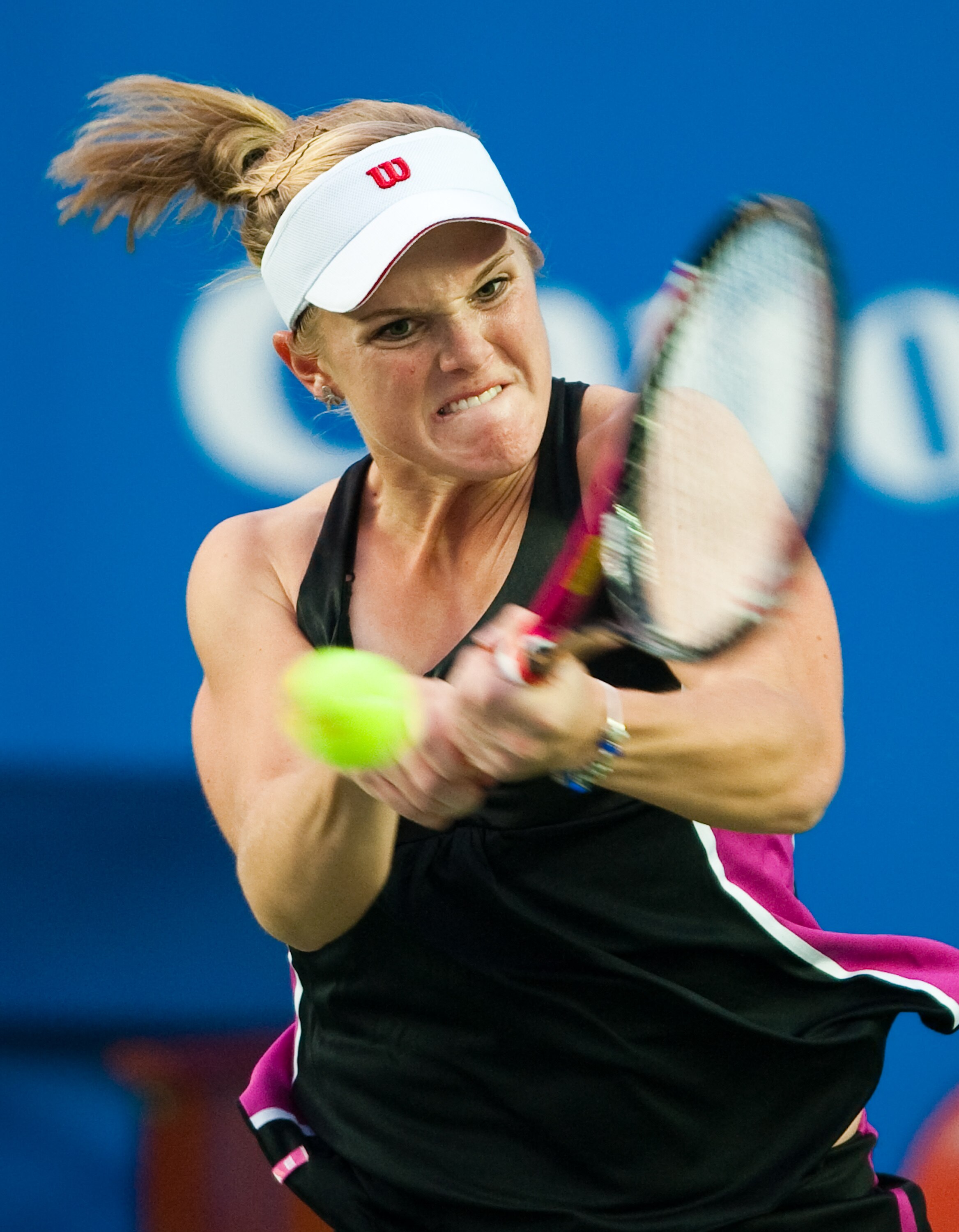 HONG KONG - JANUARY 07: Melanie Oudin of USA in action during her match against Zhang Ling of China on day three of the Hong Kong Tennis Classic 2011 at the Victoria stadium on January 7, 2011 in Hong Kong, China. (Photo by Victor Fraile/Getty Images)