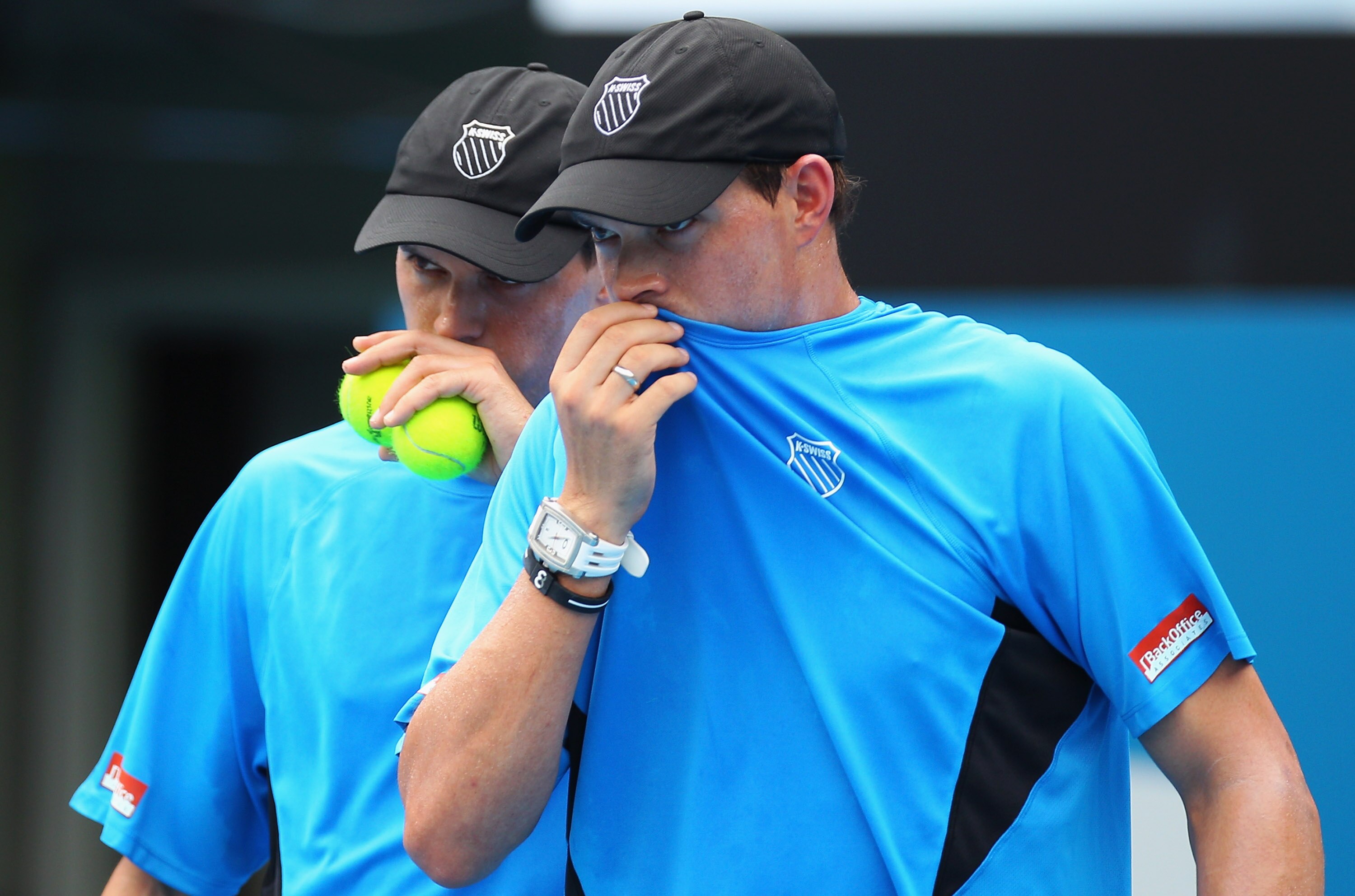 SYDNEY, AUSTRALIA - JANUARY 15:  Mike Bryan of the USA and Bob Bryan of the USA talk tactics in the men's doubles final match against Lukas Dlouhy of the Czech Republic and Paul Hanley of the Australia during day seven of the 2011 Medibank International a
