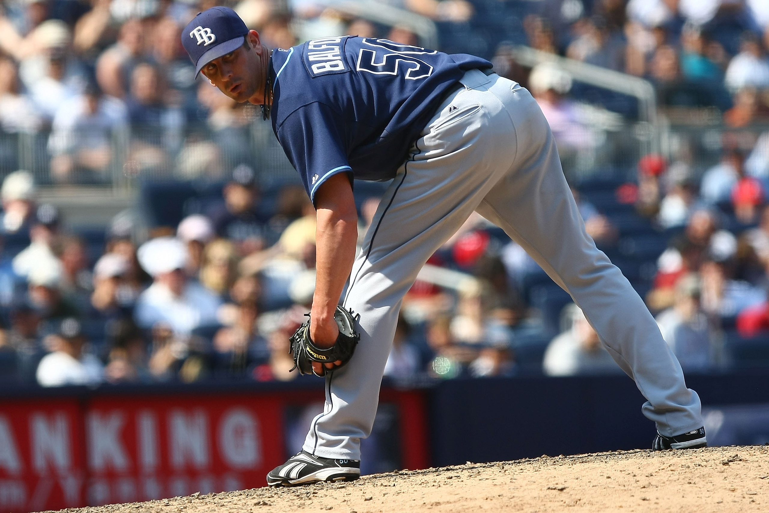 NEW YORK - JUNE 07: Grant Balfour #50 of the Tampa Bay Rays checks ffirst base against the New York Yankees during their game on June 7, 2009 at Yankee Stadium in the Bronx borough of New York City.  (Photo by Chris McGrath/Getty Images)