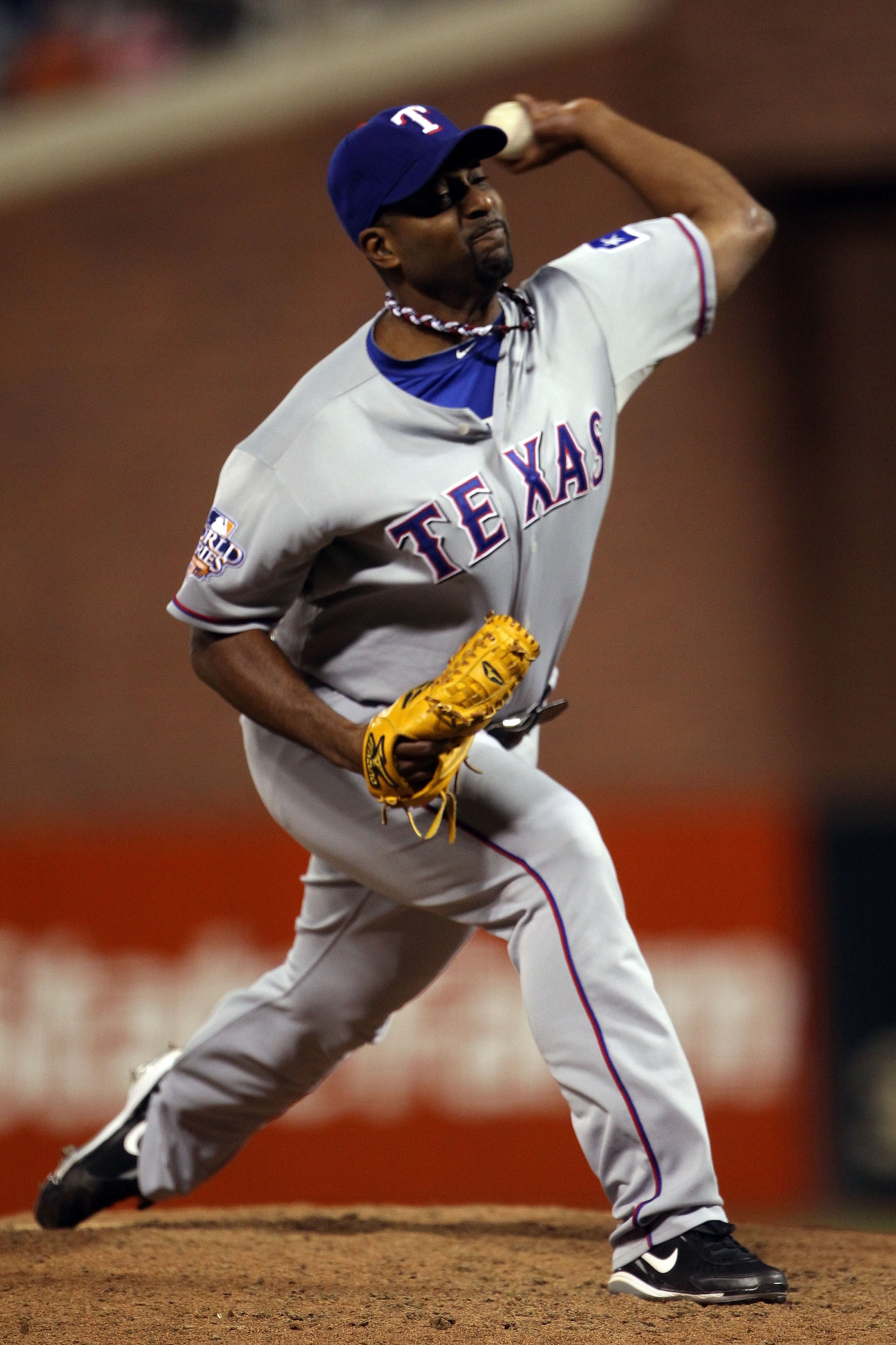 SAN FRANCISCO - OCTOBER 28:  Darren Oliver #28 of the Texas Rangers pitches in the seventh inning while taking on the San Francisco Giants in Game Two of the 2010 MLB World Series at AT&T Park on October 28, 2010 in San Francisco, California.  (Photo by D