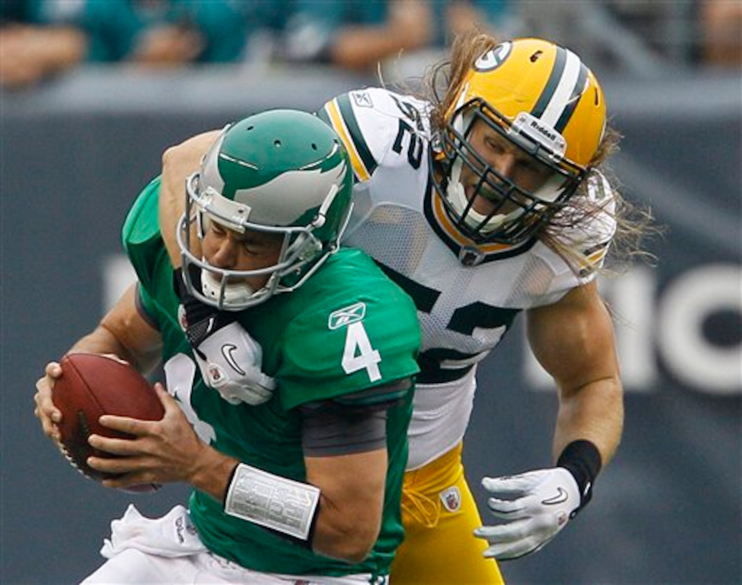 Kevin Kolb is lucky that Clay Matthews didn't take his head off on this play.