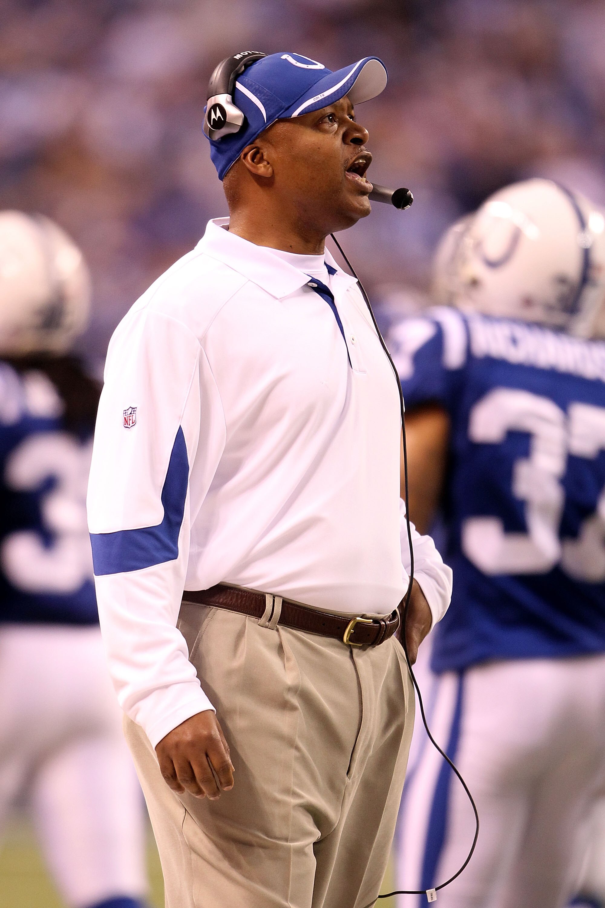 INDIANAPOLIS, IN - JANUARY 08:  Head coach Jim Caldwell of the Indianapolis Colts reacts as he coaches against the New York Jets during their 2011 AFC wild card playoff game at Lucas Oil Stadium on January 8, 2011 in Indianapolis, Indiana. The Jets won 17