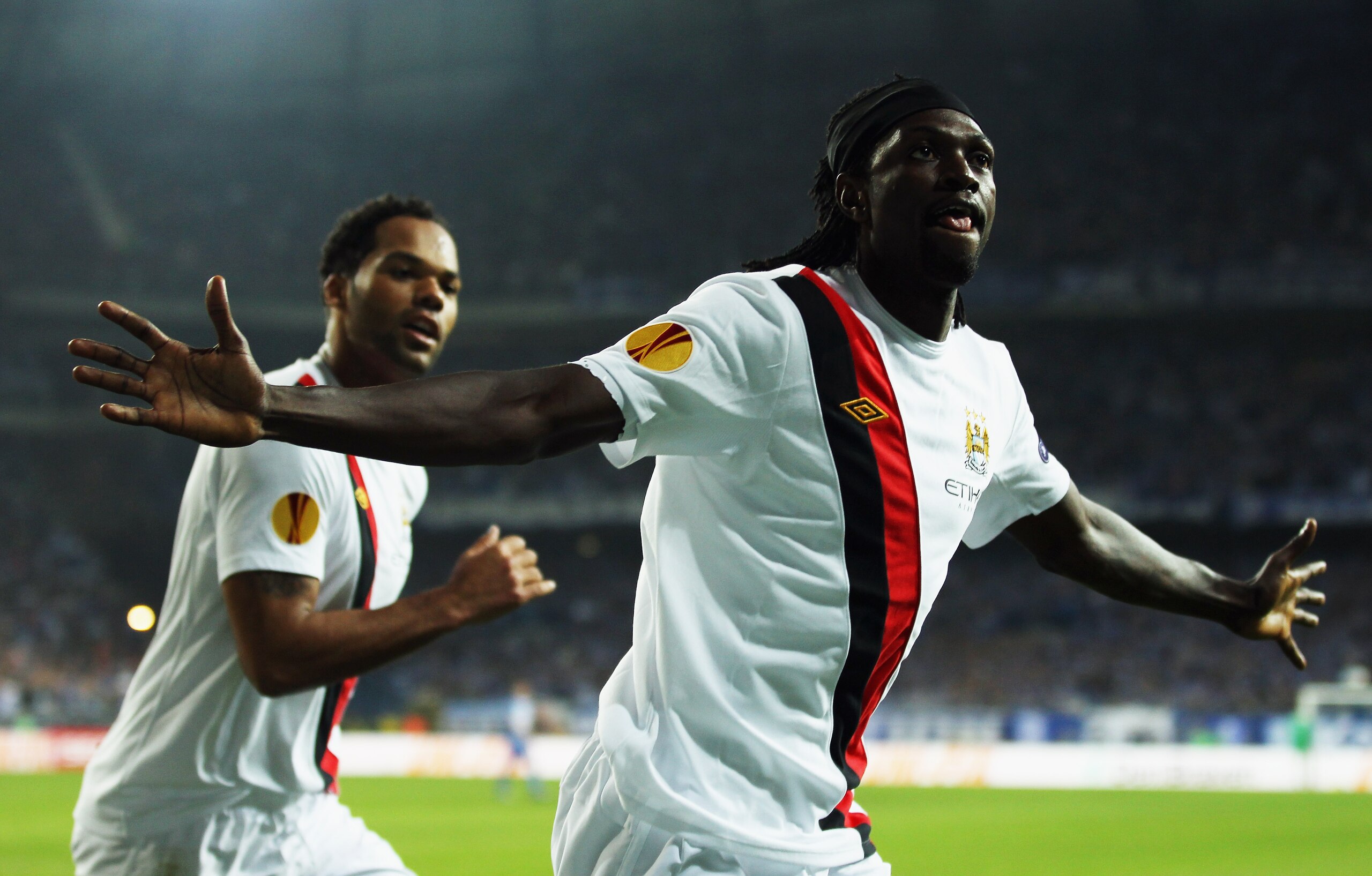 POZNAN, POLAND - NOVEMBER 04: Emmanuel Adebayor of Manchester City celebrates scoring during the UEFA Europa League Group A match between KKS Lech Poznan and Manchester City at the Bulgarska Street Stadium on November 4, 2010 in Poznan, Poland. (Photo b POZNAN, POLAND - NOVEMBER 04: Emmanuel Adebayor of Manchester City celebrates scoring during the UEFA Europa League Group A match between KKS Lech Poznan and Manchester City at the Bulgarska Street Stadium on November 4, 2010 in Poznan, Poland. (Photo b