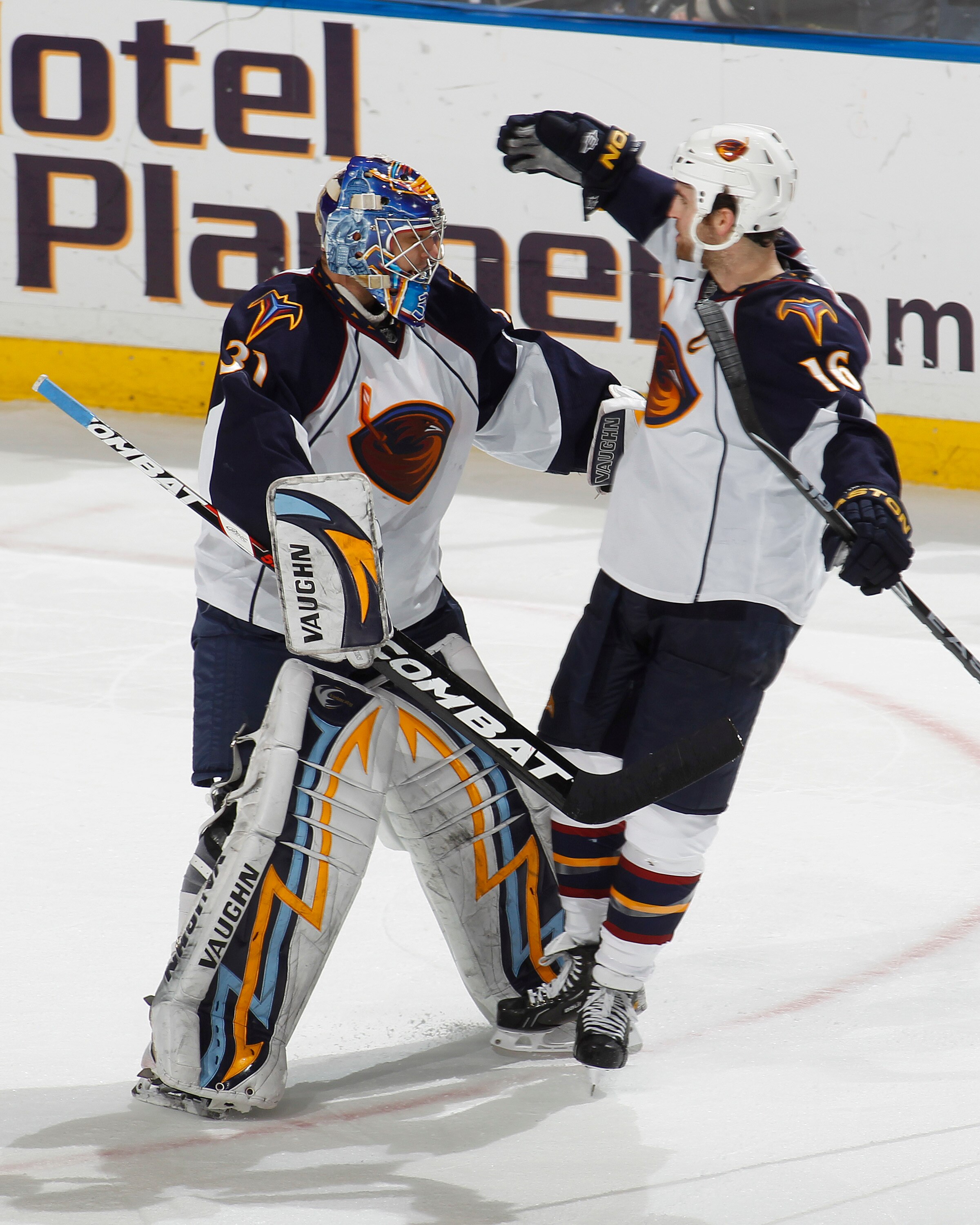 SUNRISE, FL - JANUARY 17: Goaltender Ondrej Pavelec #31 is congratulated by Andrew Ladd #16 of the Atlanta Thrashers after they defeated the Florida Panthers 3-2 in a shoot out on January 17, 2011 at the BankAtlantic Center in Sunrise, Florida. (Photo by