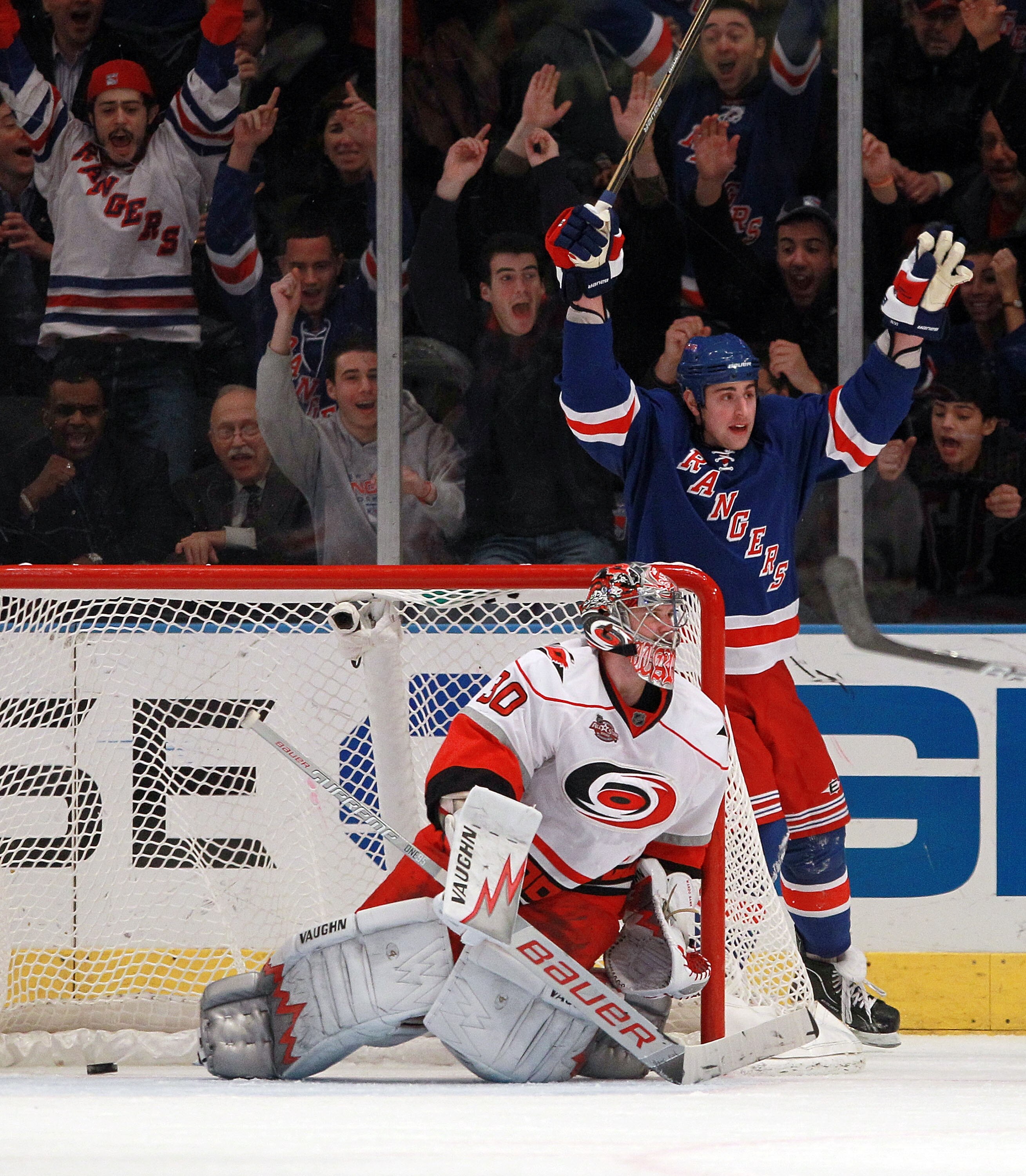 NEW YORK, NY - JANUARY 05:  Brandon Dubinsky #17 of the New York Rangers celebrates a goal against Cam Ward #30 of the Carolina Hurricanes at Madison Square Garden on January 5, 2011 in New York City. The Rangers defeated the Hurricanes 2-1 in overtime.