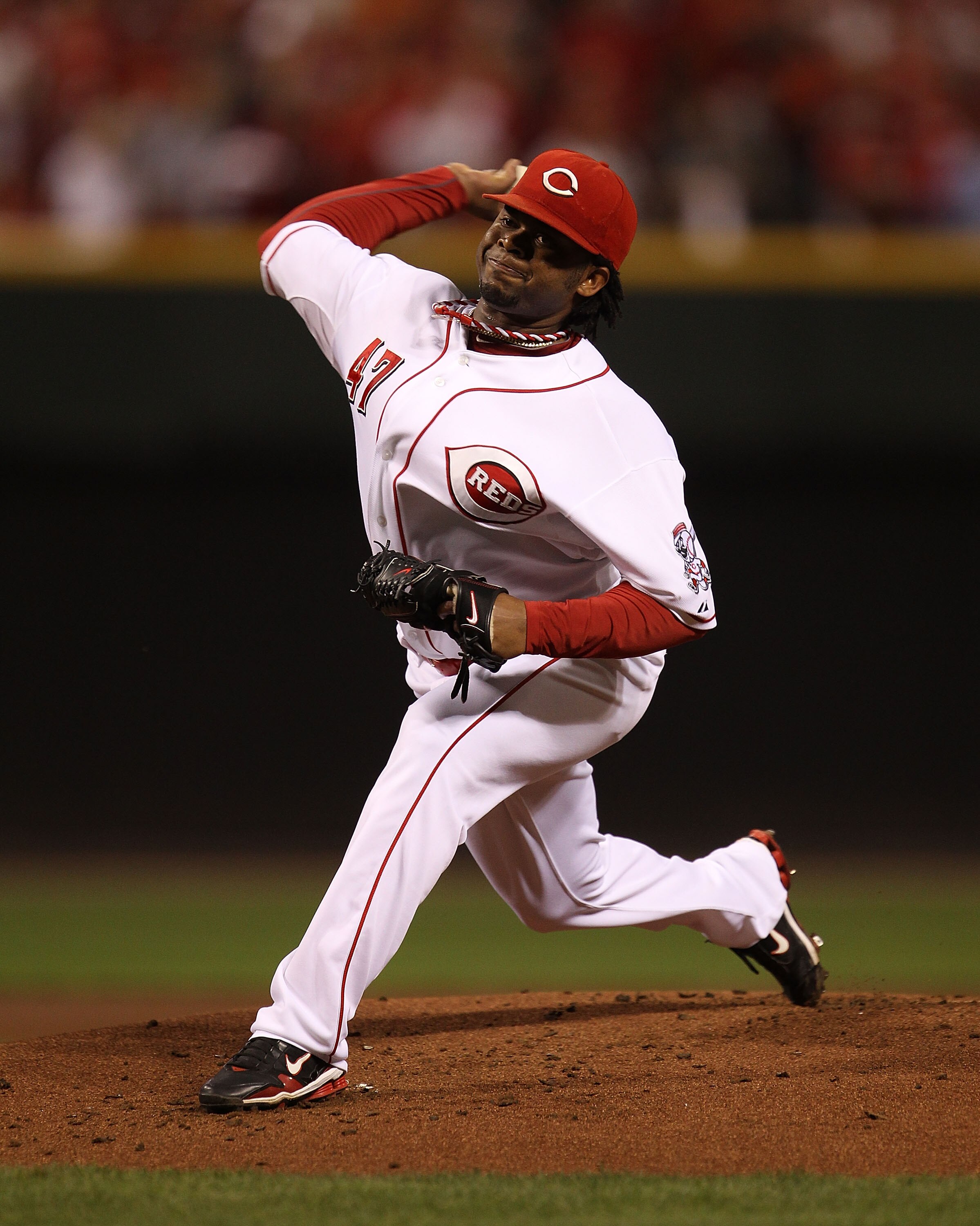 CINCINNATI - OCTOBER 10: Starting pitcher Johnny Cueto #47 of the Cincinnati Reds delivers the ball against the Philadelphia Phillies during game 3 of the NLDS at Great American Ball Park on October 10, 2010 in Cincinnati, Ohio. The Phillies defeated the